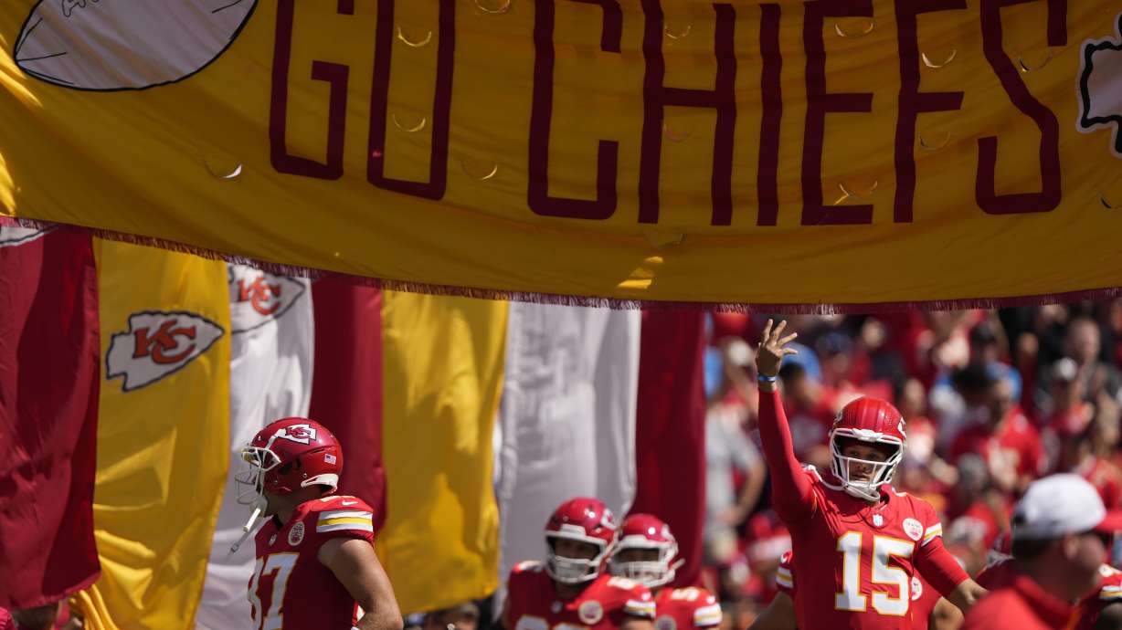 Kansas City Chiefs quarterback Patrick Mahomes (15) runs onto the field before an NFL preseason football game against the Detroit Lions Saturday, Aug. 17, 2024, in Kansas City, Mo.