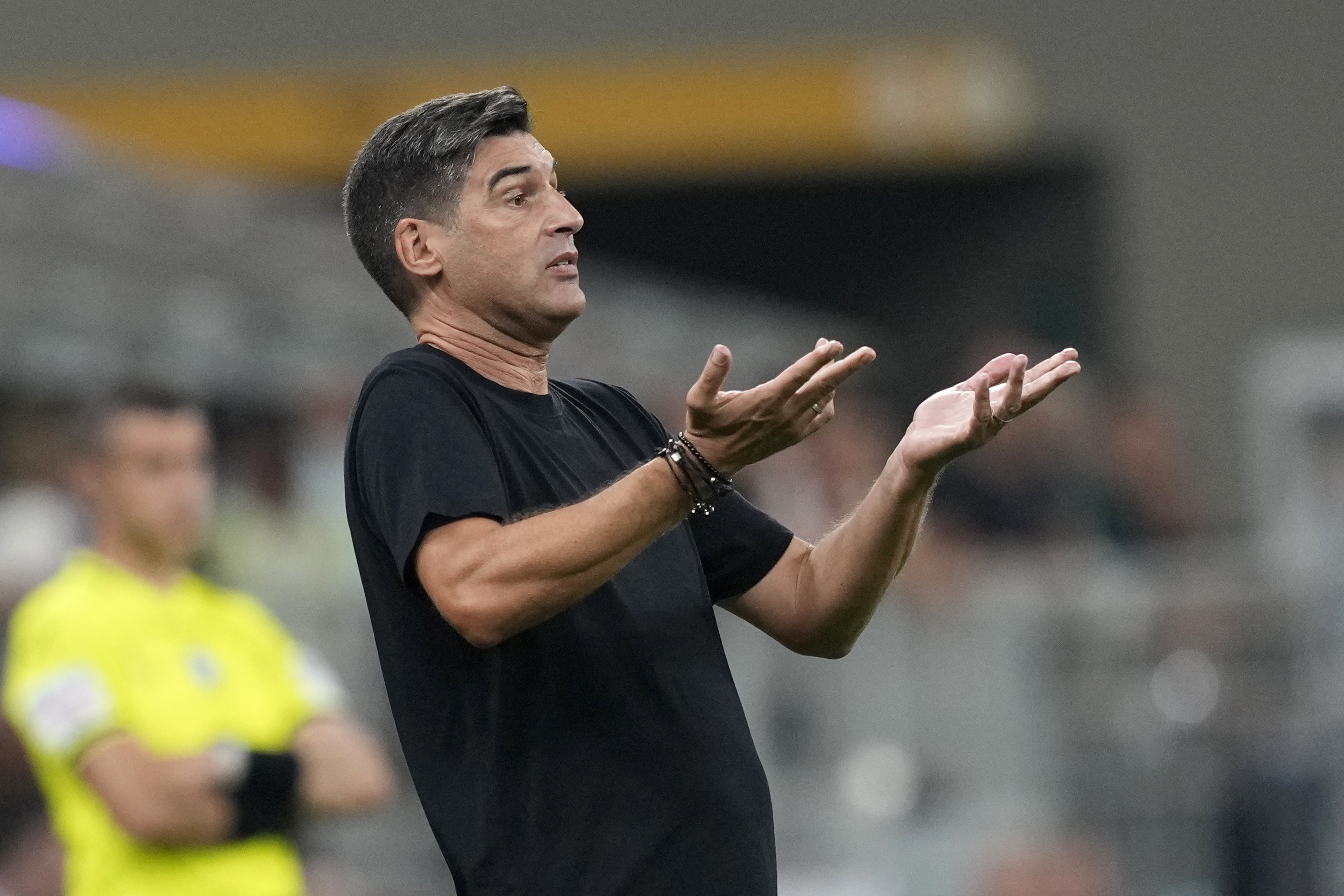AC Milan's head coach Paulo Fonseca reacts during the Serie A soccer match between AC Milan and Torino at the San Siro stadium, in Milan, Italy, Saturday, Aug. 17, 2024.