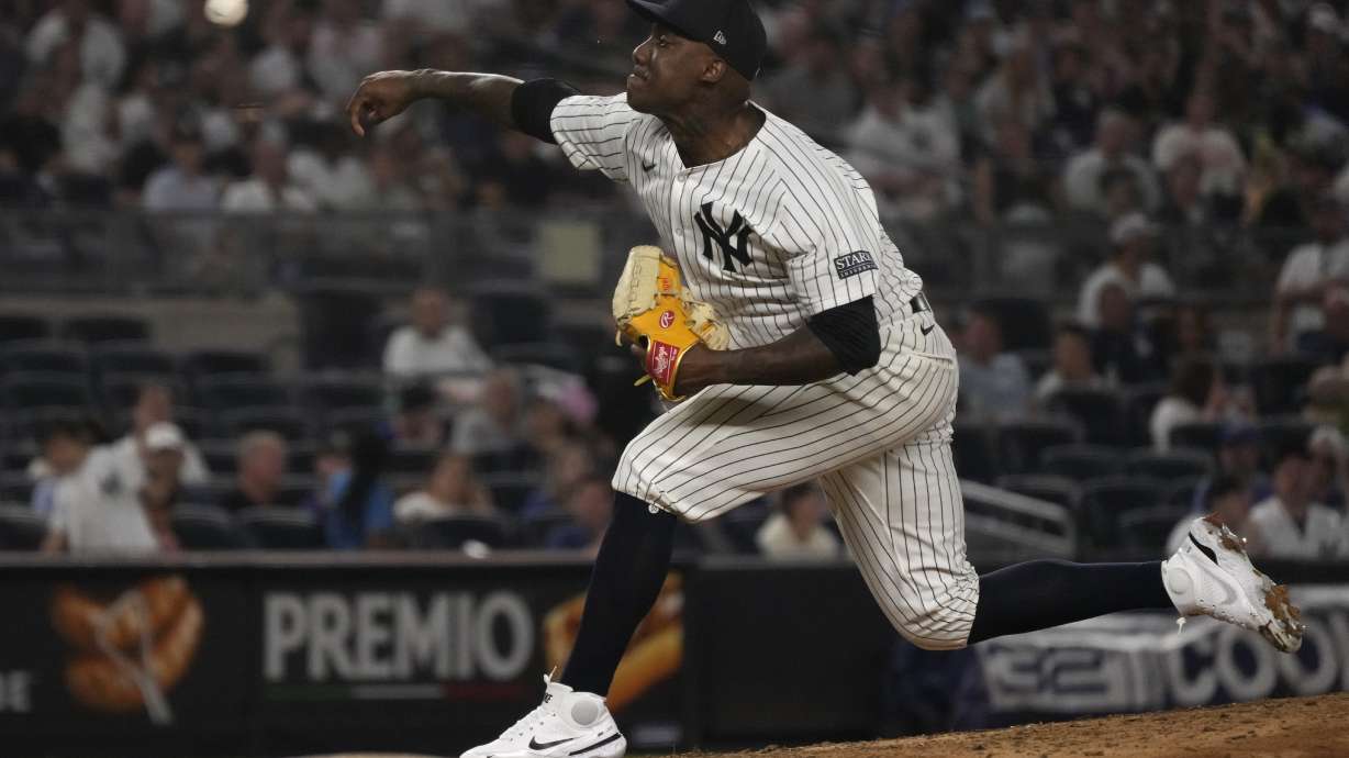 New York Yankees' Enyel De Los Santos pitches during the seventh inning of a baseball game against the Toronto Blue Jays, Friday, Aug. 2, 2024, in New York.