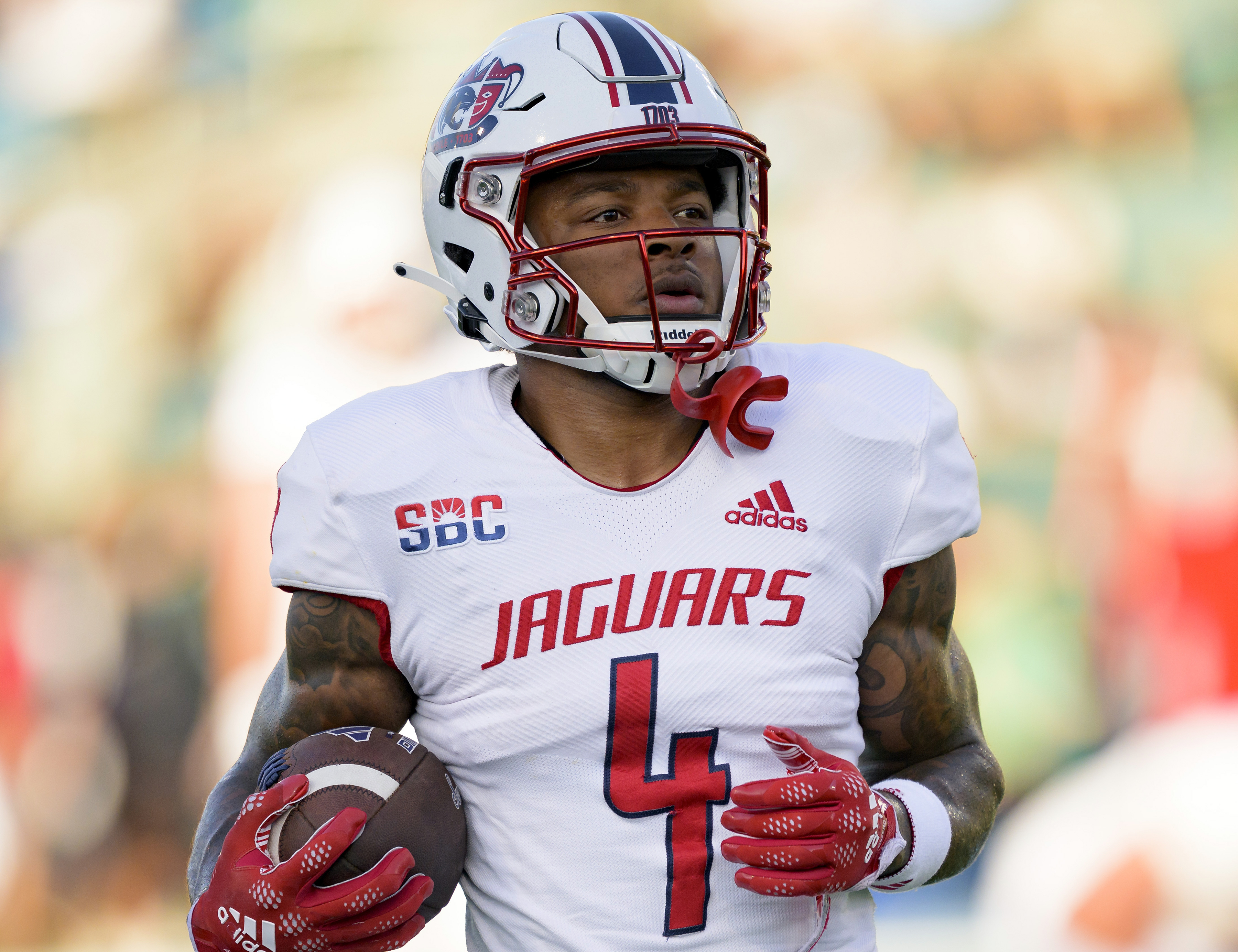 FILE - South Alabama wide receiver Caullin Lacy runs with the ball during an NCAA football game against Tulane, Sept. 2, 2023, in New Orleans. 