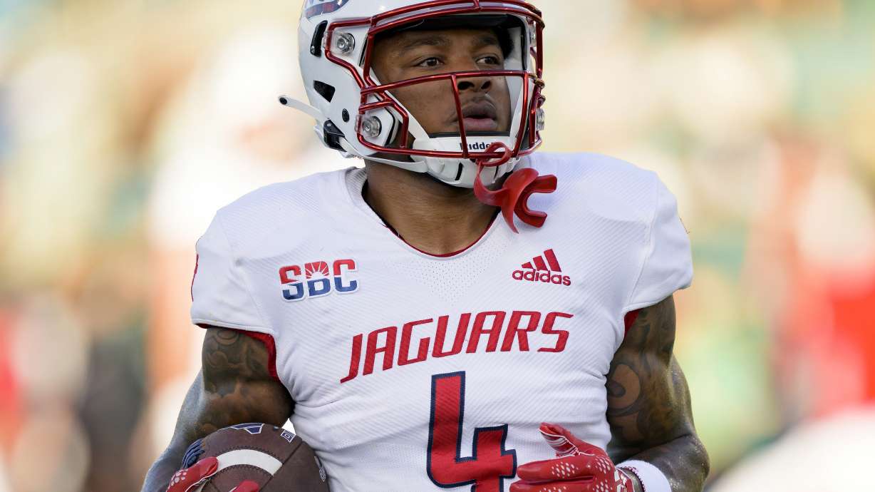 FILE - South Alabama wide receiver Caullin Lacy runs with the ball during an NCAA football game against Tulane, Sept. 2, 2023, in New Orleans.