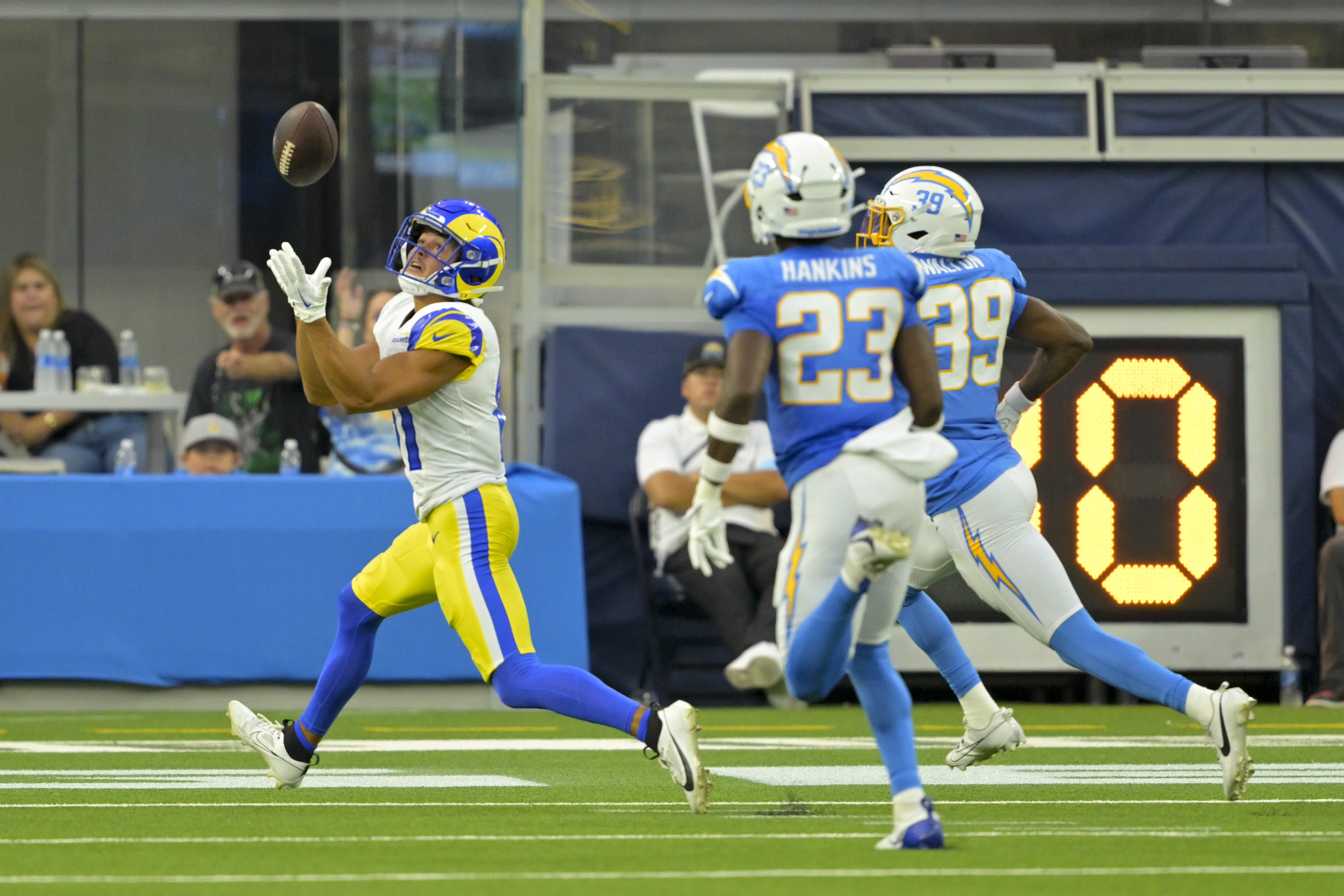Los Angeles Rams wide receiver JJ Laap, left, makes a touchdown catch during the second half of a preseason NFL football game against the Los Angeles Chargers, Saturday, Aug. 17, 2024, in Inglewood, Calif. 
