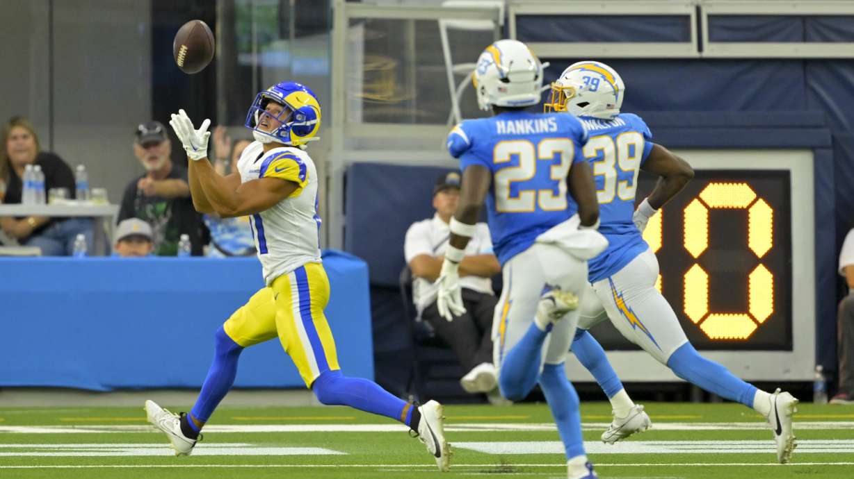 Los Angeles Rams wide receiver JJ Laap, left, makes a touchdown catch during the second half of a preseason NFL football game against the Los Angeles Chargers, Saturday, Aug. 17, 2024, in Inglewood, Calif.