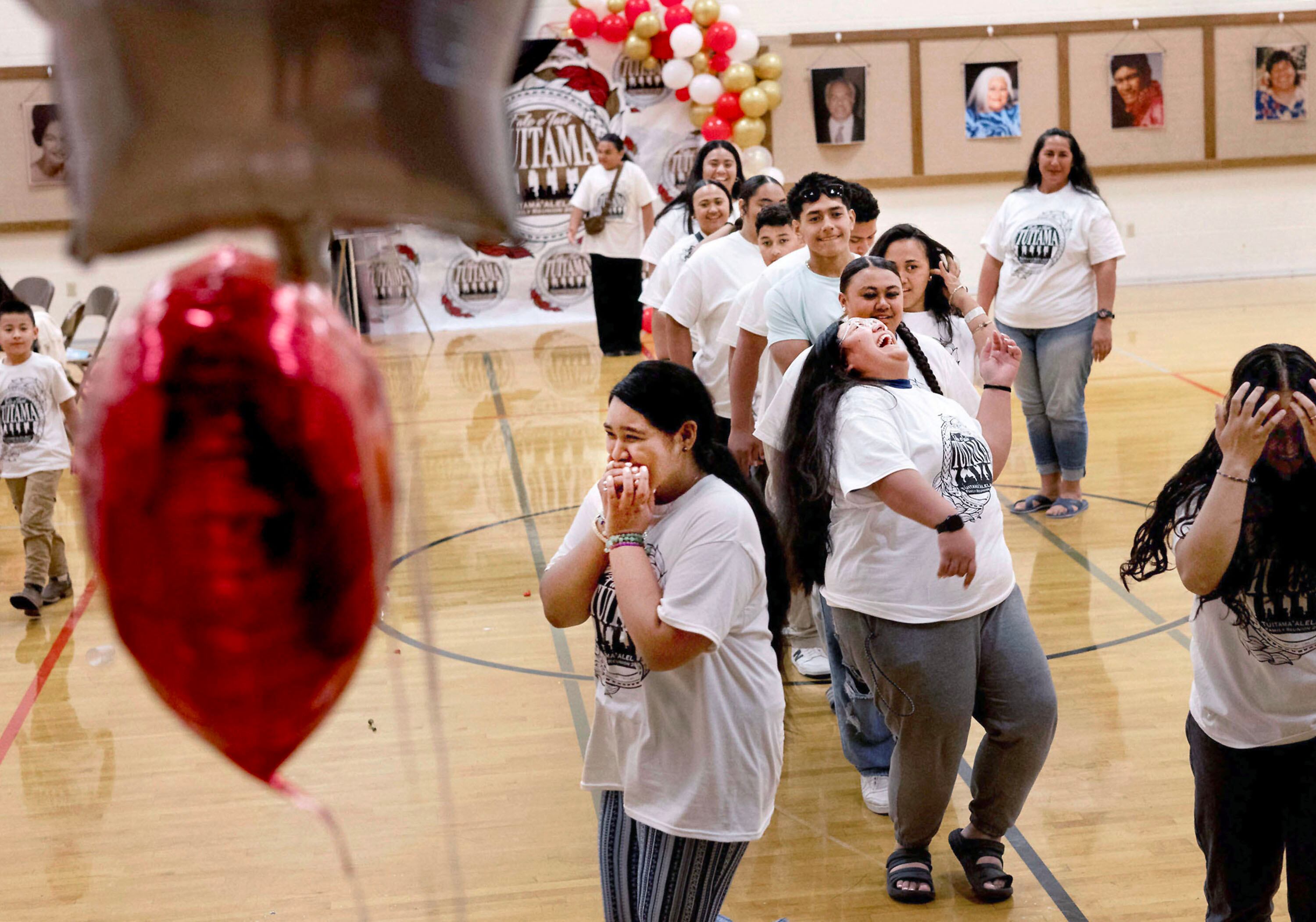 Tu’itama’alelagi family members play a game at their family reunion in North Salt Lake on July 5. Pacific Island culture honors family, God and community.