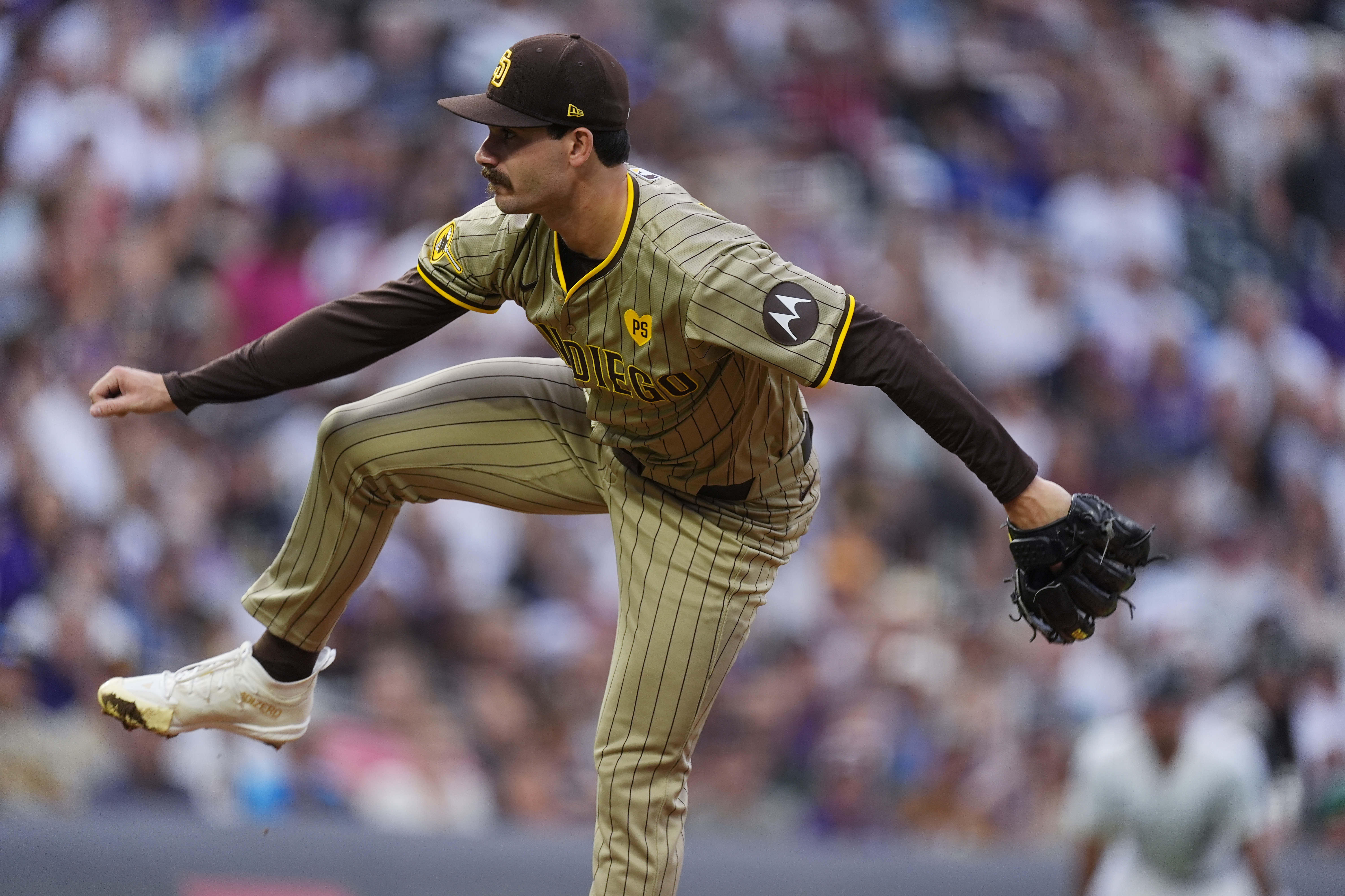 San Diego Padres starting pitcher Dylan Cease works against the Colorado Rockies in the first inning of a baseball game Saturday, Aug. 17, 2024, in Denver. 