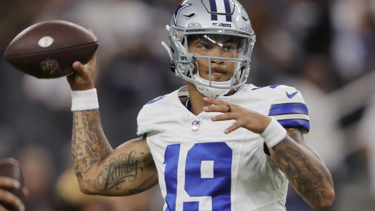 Dallas Cowboys quarterback Trey Lance warms up before an NFL preseason football game against the Las Vegas Raiders, Saturday, Aug. 17, 2024, in Las Vegas.