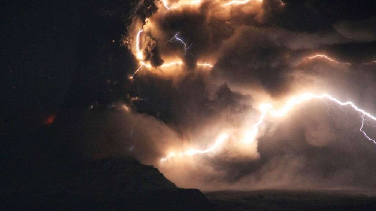 The eruption of the Shiveluch volcano reportedly caused by 7.0-magnitude earthquake about 63 miles east of Petropavlovsk-Kamchatsky on the Kamchatka peninsula, Russia.