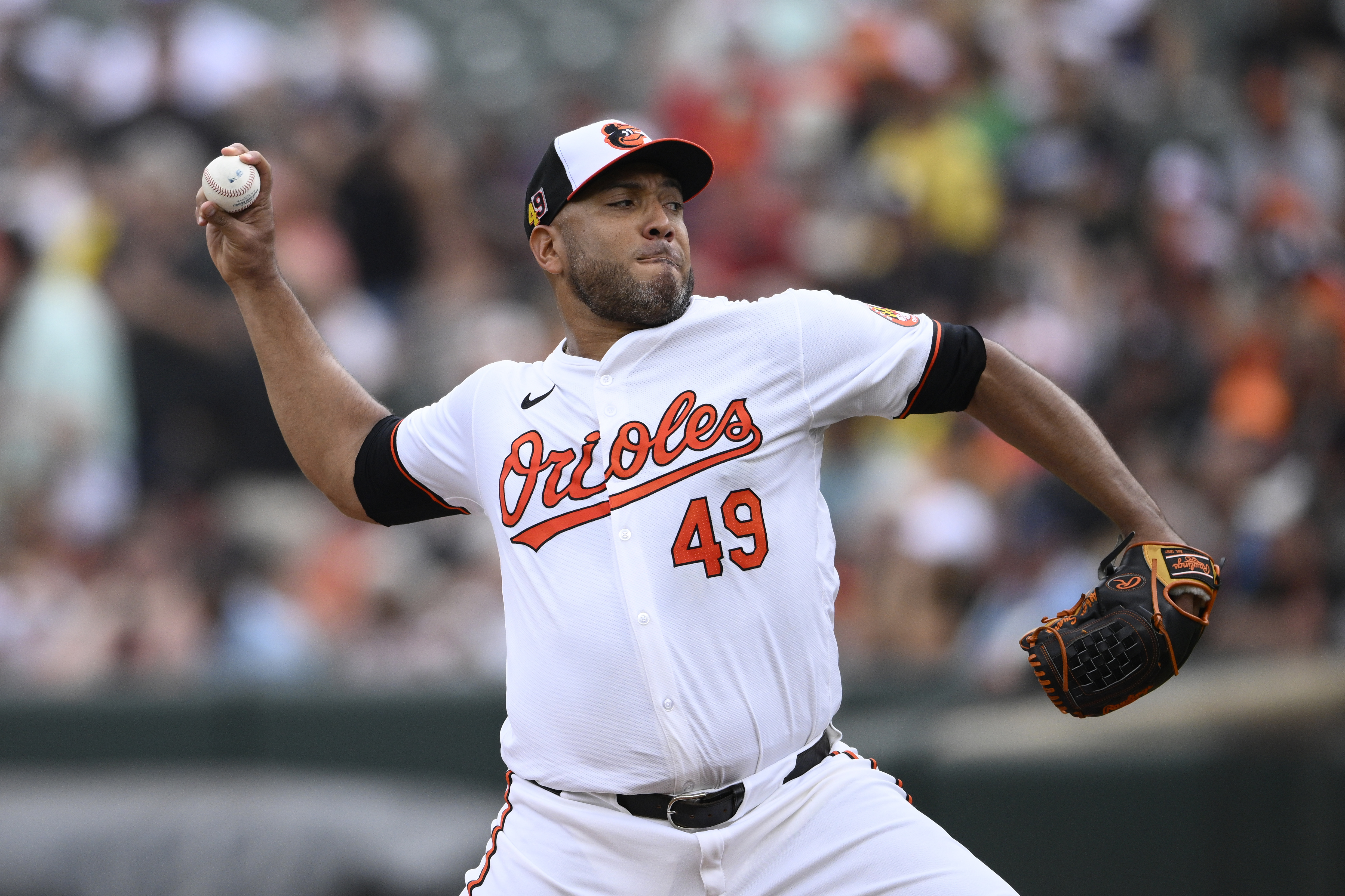 Baltimore Orioles starting pitcher Albert Suarez throws during the second inning of a baseball game against the Boston Red Sox, Sunday, Aug. 18, 2024, in Baltimore. 