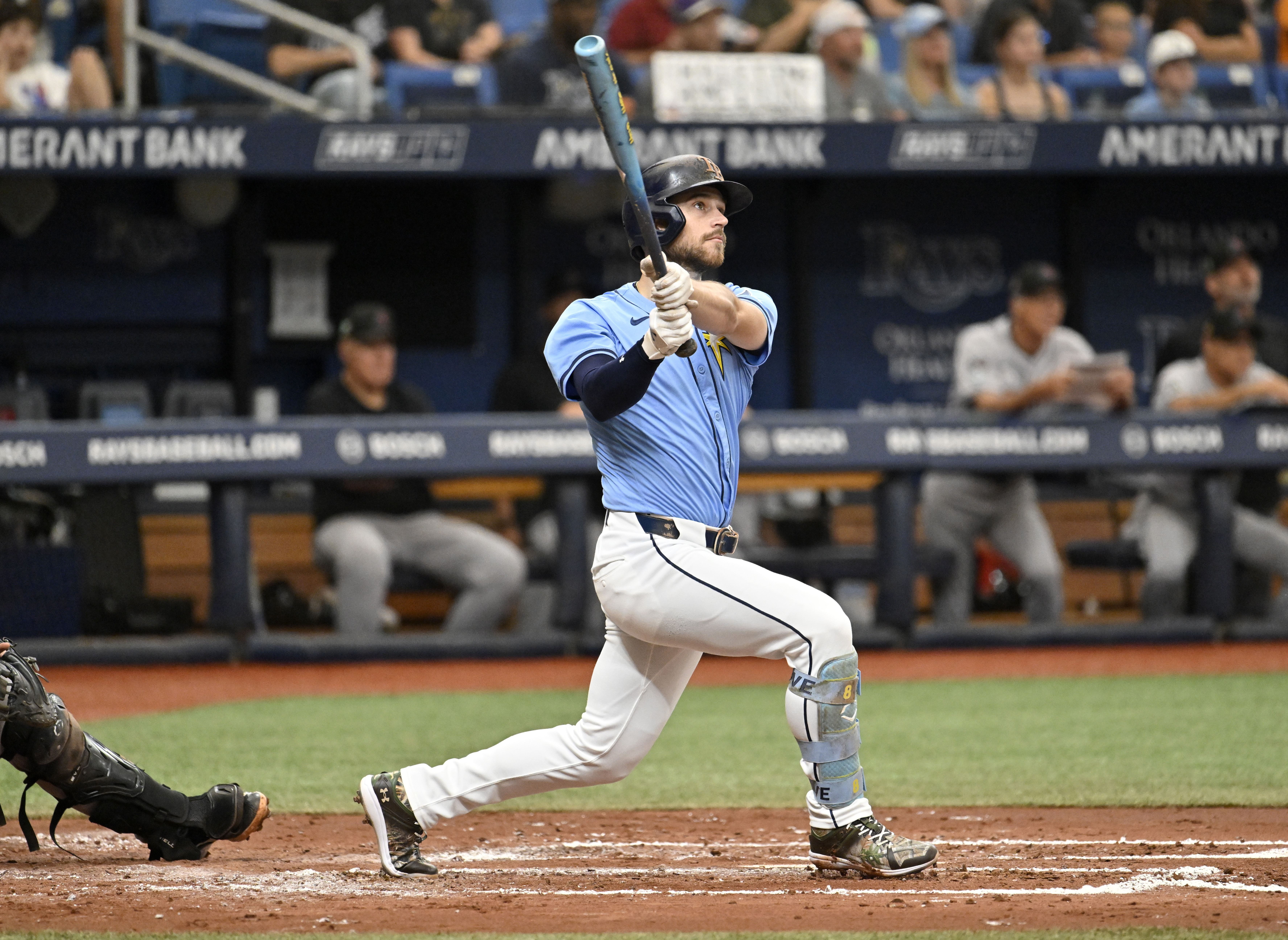 Tampa Bay Rays second base Brandon Lowe hits a two-run home run against the Arizona Diamondbacks during the third inning of a baseball game Sunday, Aug. 18, 2024, in St. Petersburg, Fla. 