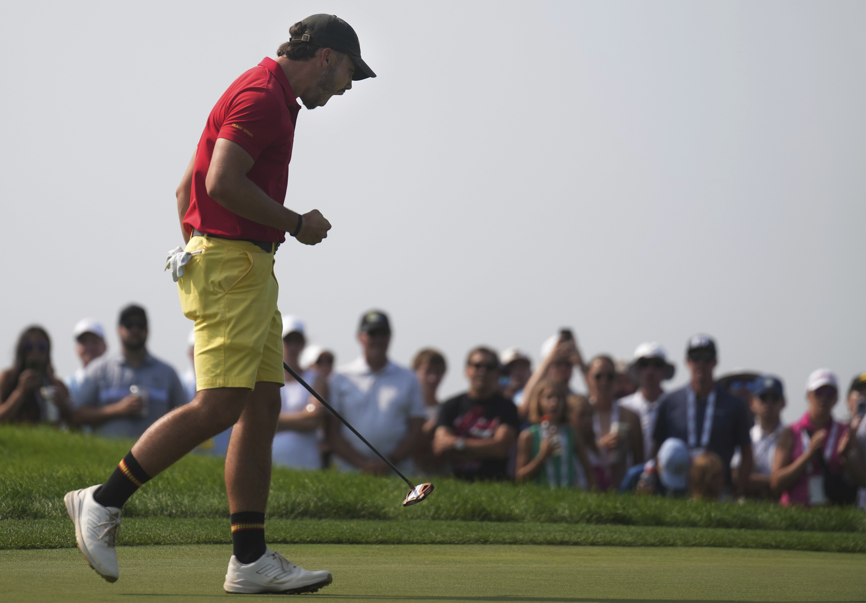 Jose Luis Ballester reacts after his shot for the 15th hole in Chaska, Minn., Sunday, Aug. 18, 2024, during the championship match against Noah Kent in the U.S. Amateur golf tournament. 