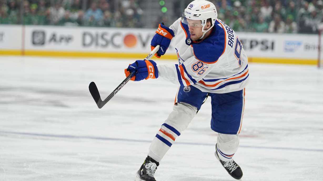 FILE - Edmonton Oilers defenseman Philip Broberg shoots against the Dallas Stars during the second period of Game 5 of the Western Conference finals in the NHL hockey Stanley Cup playoffs Friday, May 31, 2024, in Dallas.
