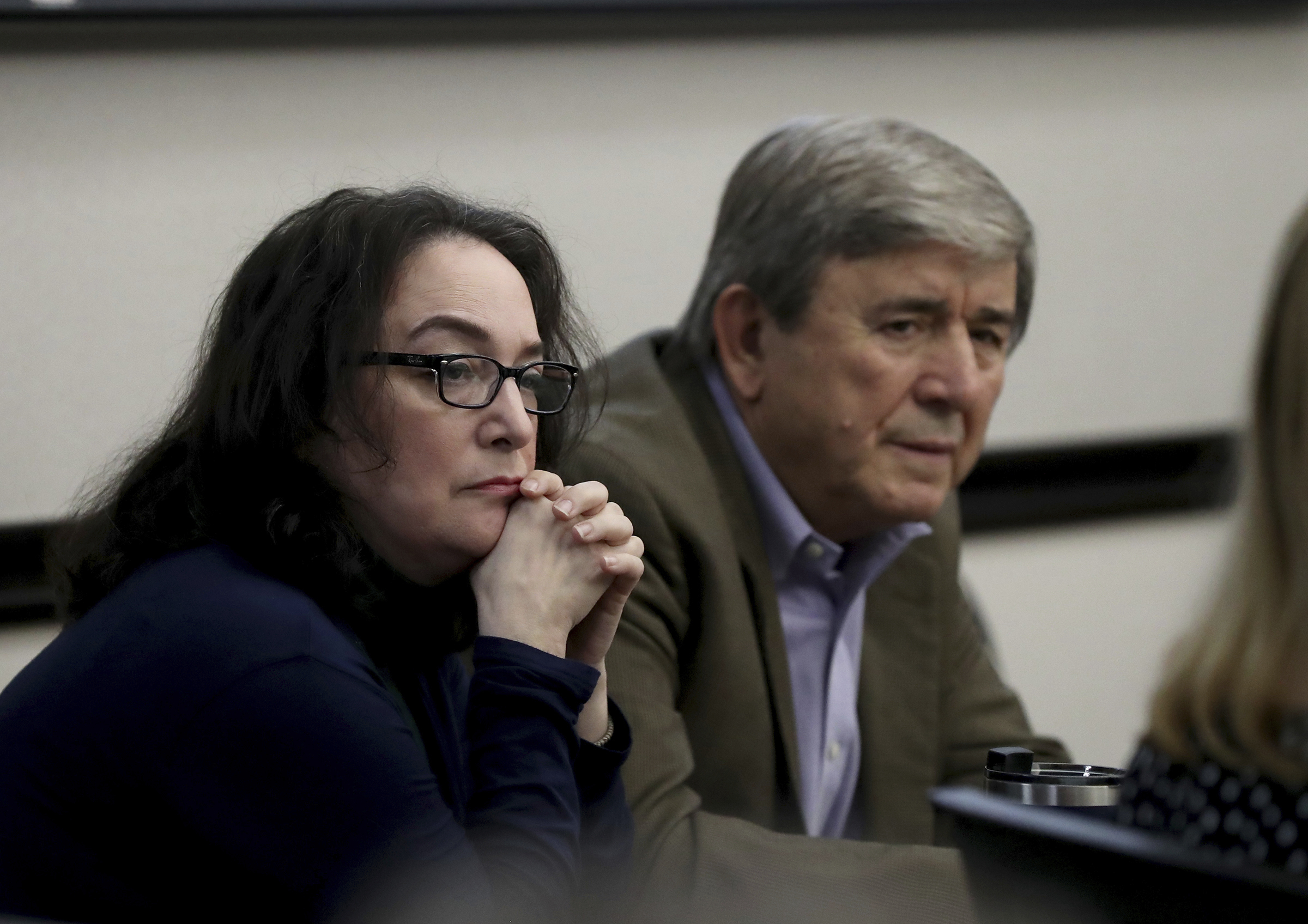 Rose Marie Kosmetatos, left, and her husband, Antonios Pagourtzis, parents of accused Santa Fe High School shooter Dimitrios Pagourtzis, sit in court Aug. 16. Jurors in Texas are deciding whether they are financially liable for the shooting.