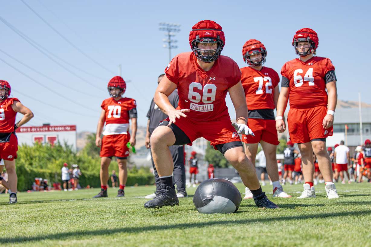Utah offensive lineman Jaren Kump takes part in drills during fall camp on Aug. 12, 2024.