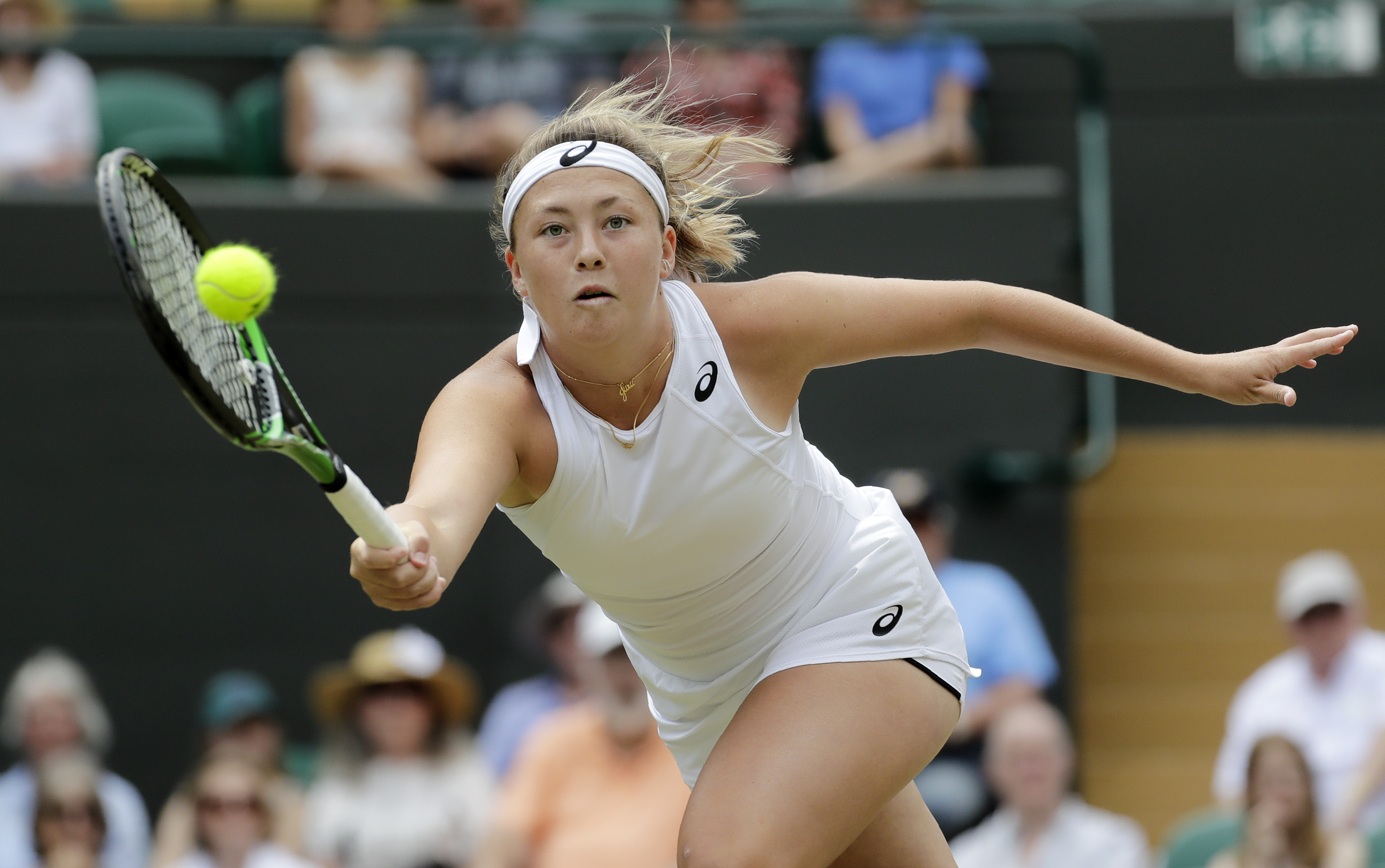 FILE - United States' Alexa Noel returns the ball to Ukraine's Daria Snigur during the girls' singles final match on day twelve of the Wimbledon Tennis Championships in London, Saturday, July 13, 2019. 