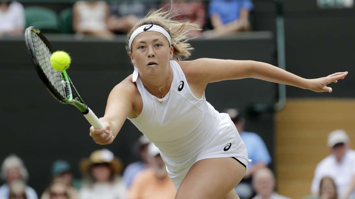 FILE - United States' Alexa Noel returns the ball to Ukraine's Daria Snigur during the girls' singles final match on day twelve of the Wimbledon Tennis Championships in London, Saturday, July 13, 2019.