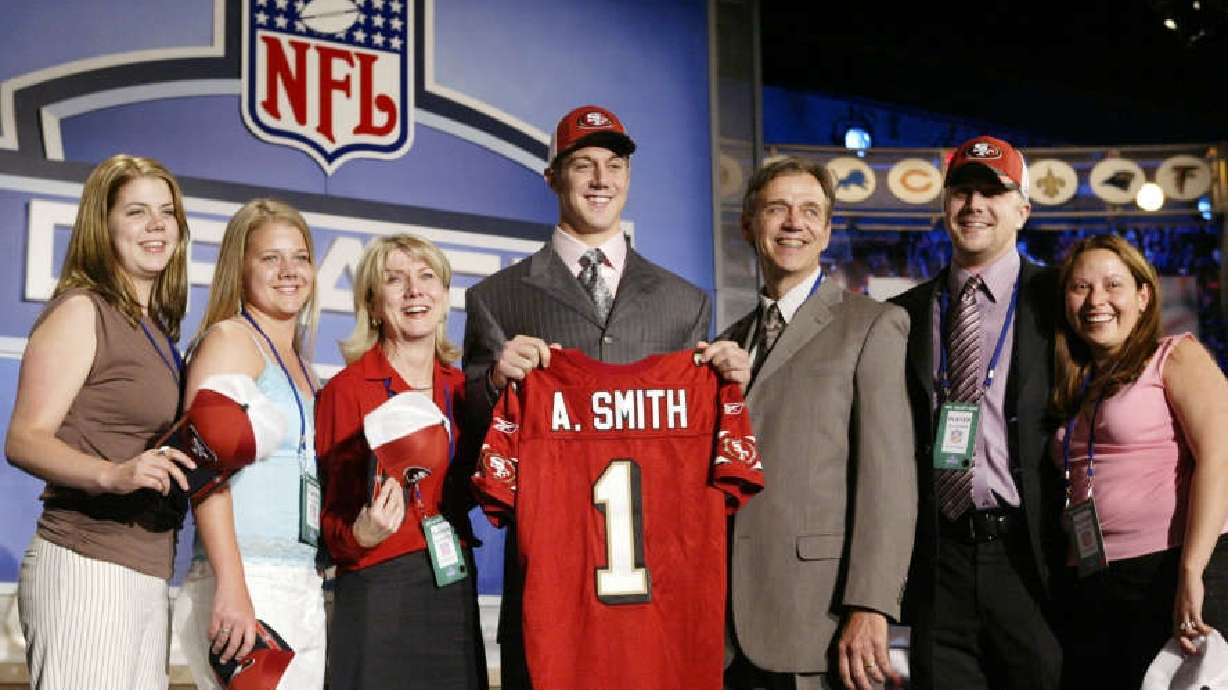 Alex Smith, center, a quarterback from Utah, stands with friends and family after being selected as the No. 1 overall pick by the San Francisco 49ers at the 2005 NFL Draft in New York Saturday, April 23, 2005.