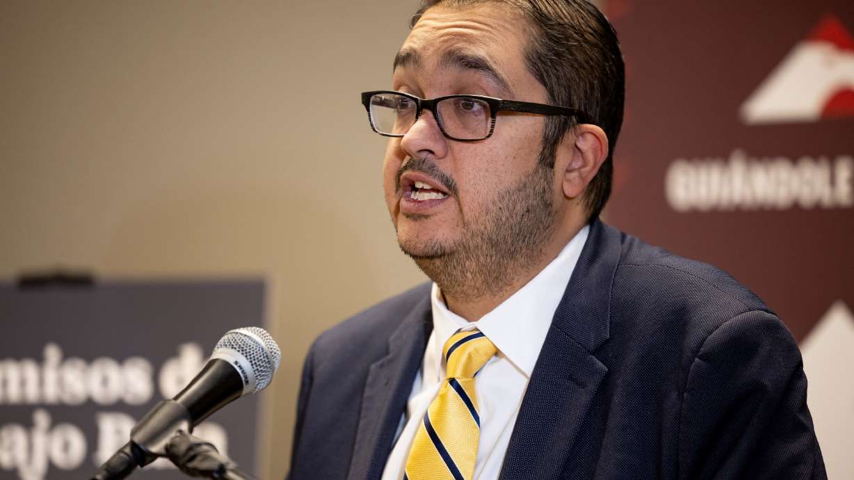 South Jordan immigration attorney Carlos Trujillo speaks in Taylorsville on Nov. 2, 2023.