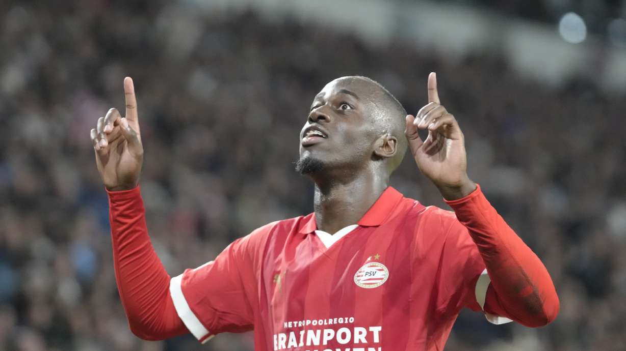 FILE - PSV's Jordan Teze celebrates after scoring his side's second goal during the Group B Champions League soccer match between PSV and Sevilla at Philips stadium in Eindhoven, Netherlands, on Oct. 3, 2023.