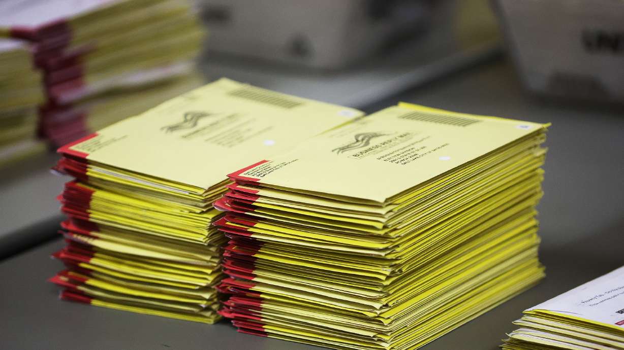Ballots at a ballot processing room in Salt Lake City on Nov. 8, 2022. A poll worker accused of doctoring accuracy tests for vote tabulation machines in Cache County pleaded guilty Monday to a reduced charge of willful neglect of duty by a poll worker.