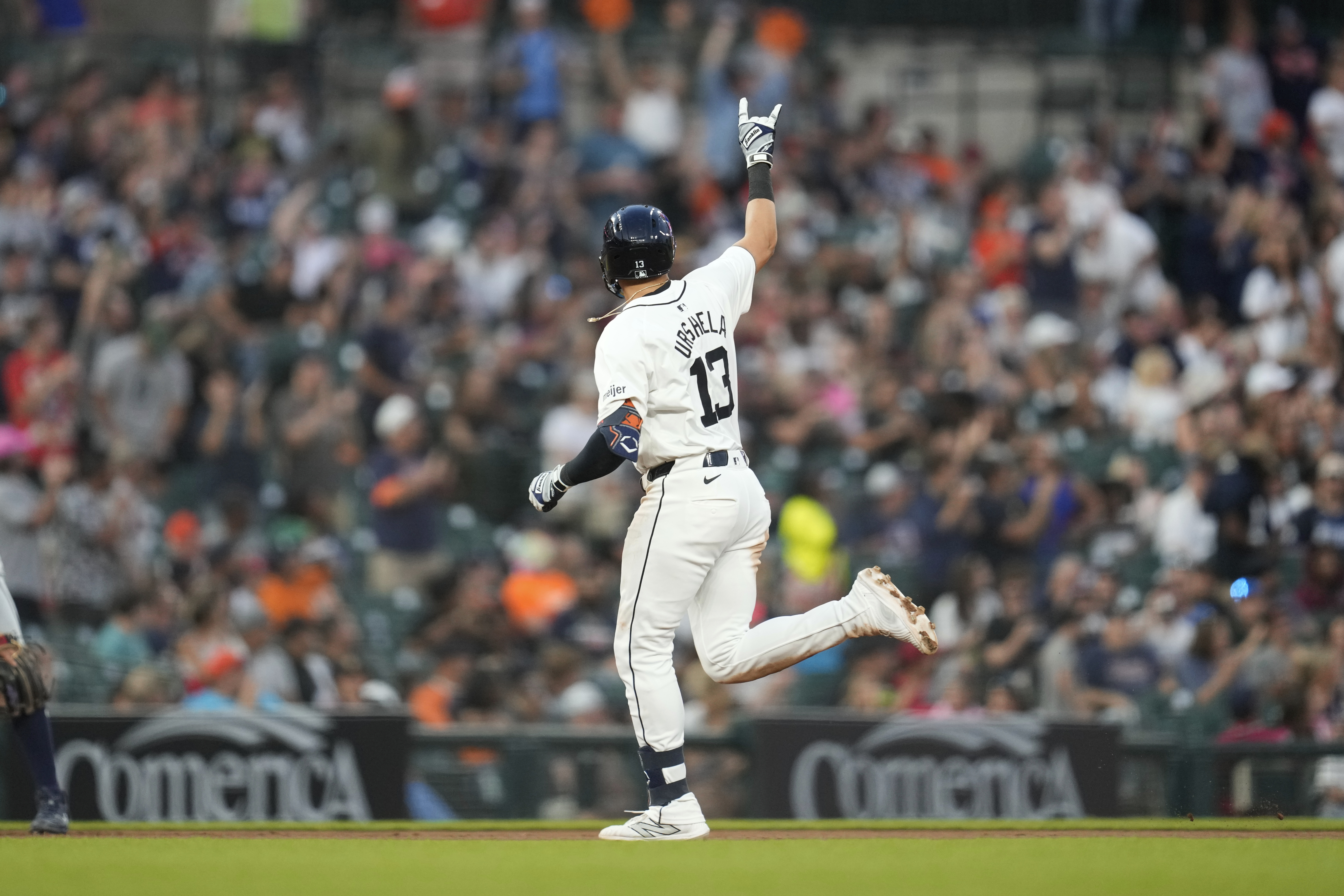 Detroit Tigers' Gio Urshela celebrates his home run against the Seattle Mariners in the sixth inning of a baseball game, Tuesday, Aug. 13, 2024, in Detroit. 