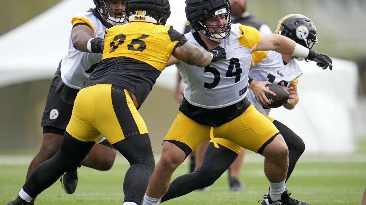 Pittsburgh Steelers nose tackle Breiden Fehoko (96) works against center Zach Frazier (54) during the NFL football team's training camp in Latrobe, Pa., Thursday, July 25, 2024.