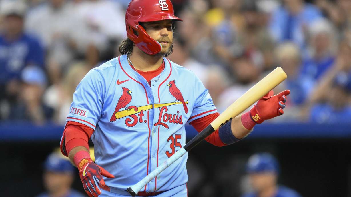 St. Louis Cardinals' Brandon Crawford tosses his bat after striking out against the Kansas City Royals during the seventh inning of a baseball game, Saturday, Aug. 10, 2024, in Kansas City, Mo.