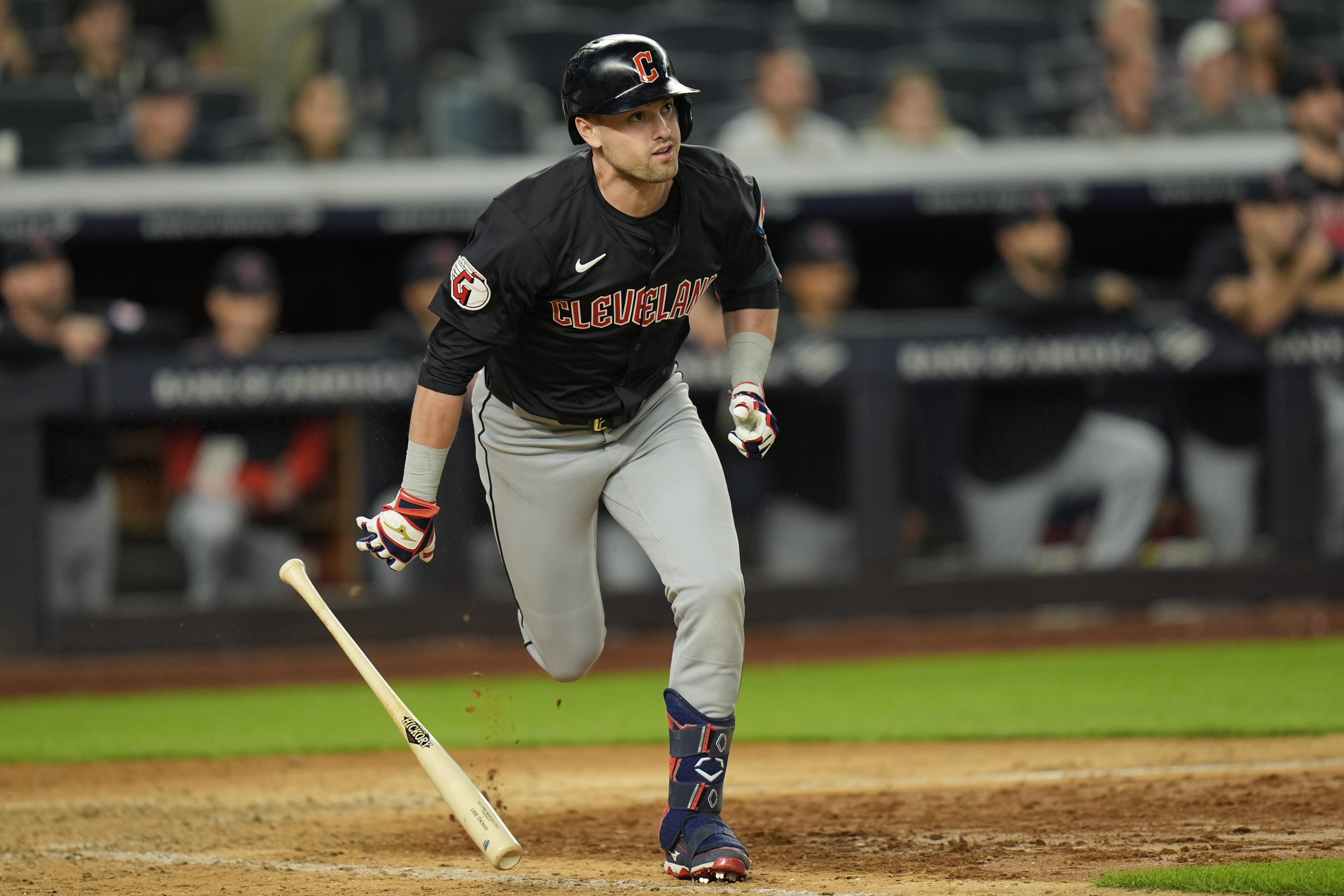 Cleveland Guardians' Lane Thomas looks after and RBI double during the 12th inning of a baseball game against the New York Yankees at Yankee Stadium Tuesday, Aug. 20, 2024, in New York. 