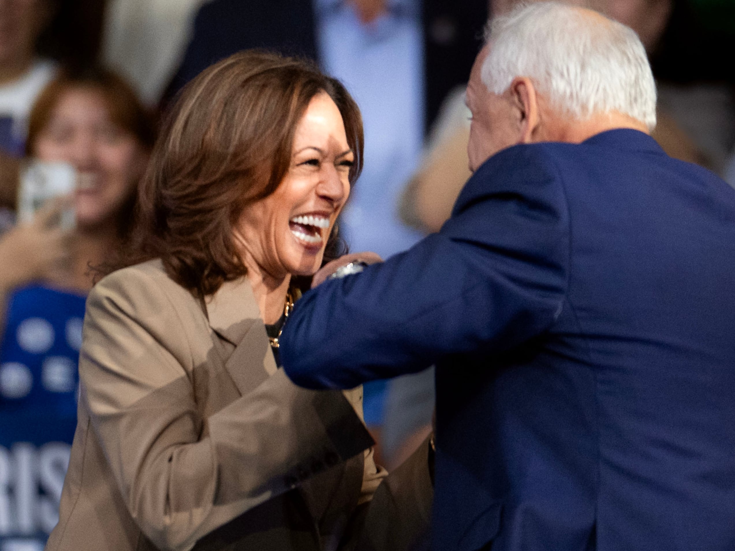 Vice President Kamala Harris greets her running mate, Minnesota Gov. Tim Walz in Glendale, Ariz., on Aug. 9. Harris is not taking sit-down interviews with the media, the Washington Post editorial board noted.