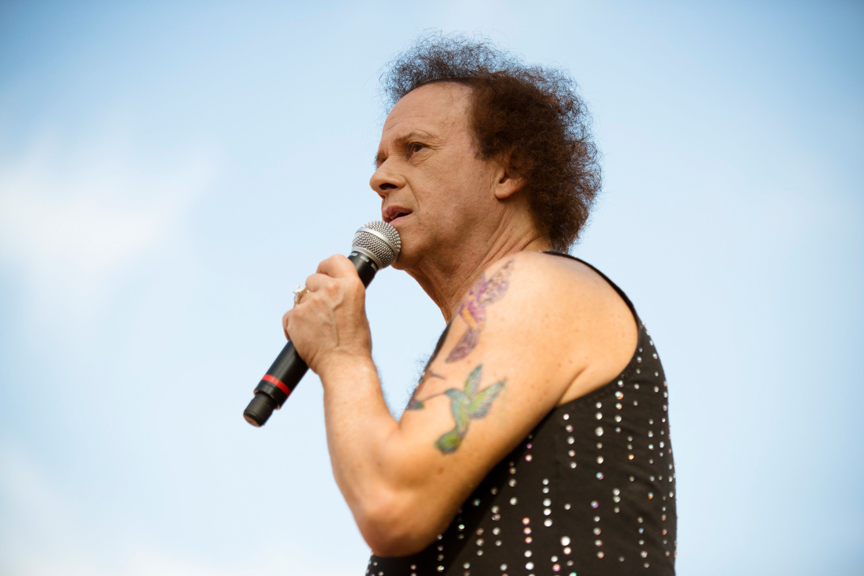 In a statement, it was said that Richard Simmons pictured here in 2013, died due to complications from recent falls and heart disease as a contributing factor.