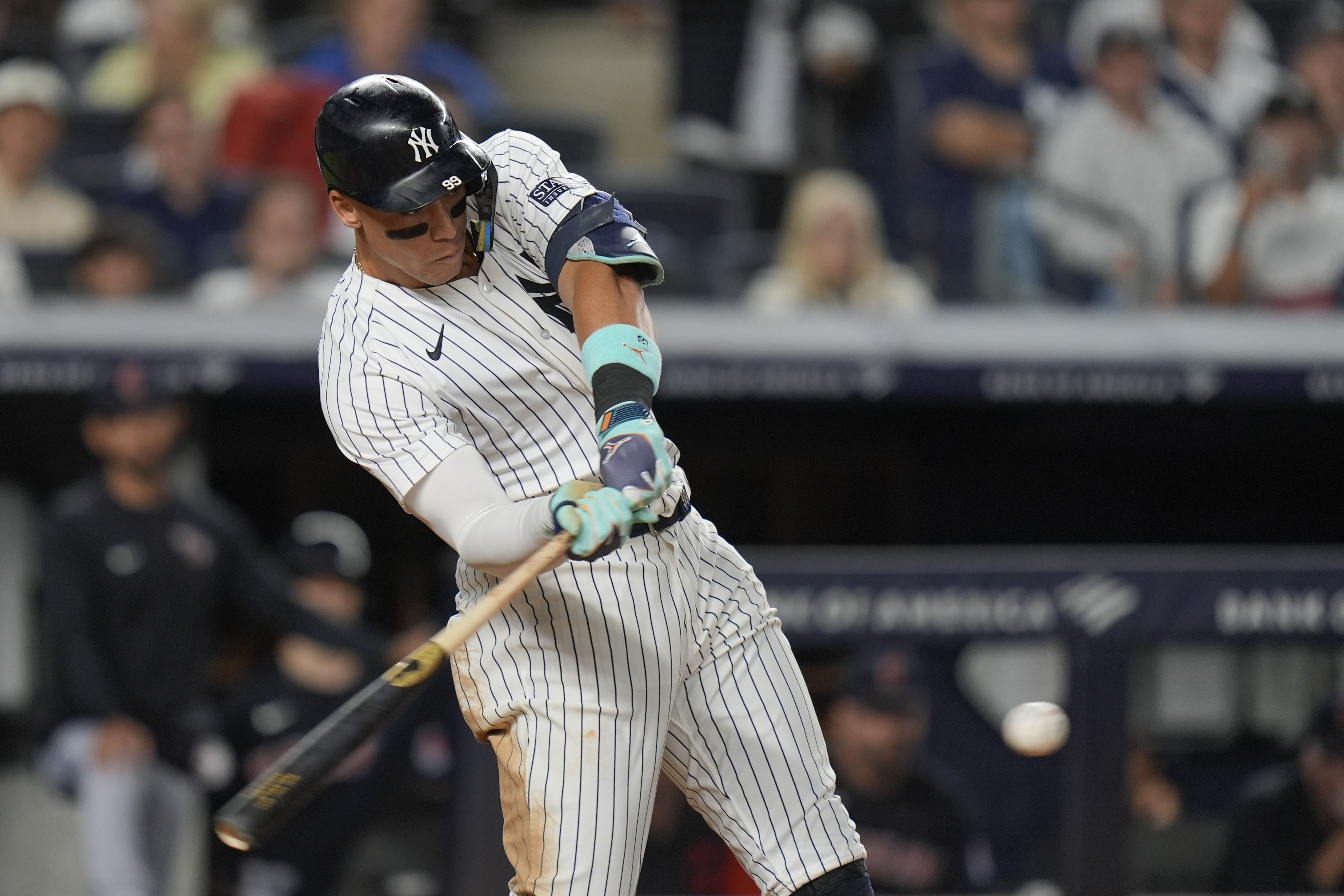 New York Yankees' Aaron Judge hits a solo home run during the seventh inning of a baseball game against the Cleveland Guardians, Wednesday, Aug. 21, 2024, in New York. 