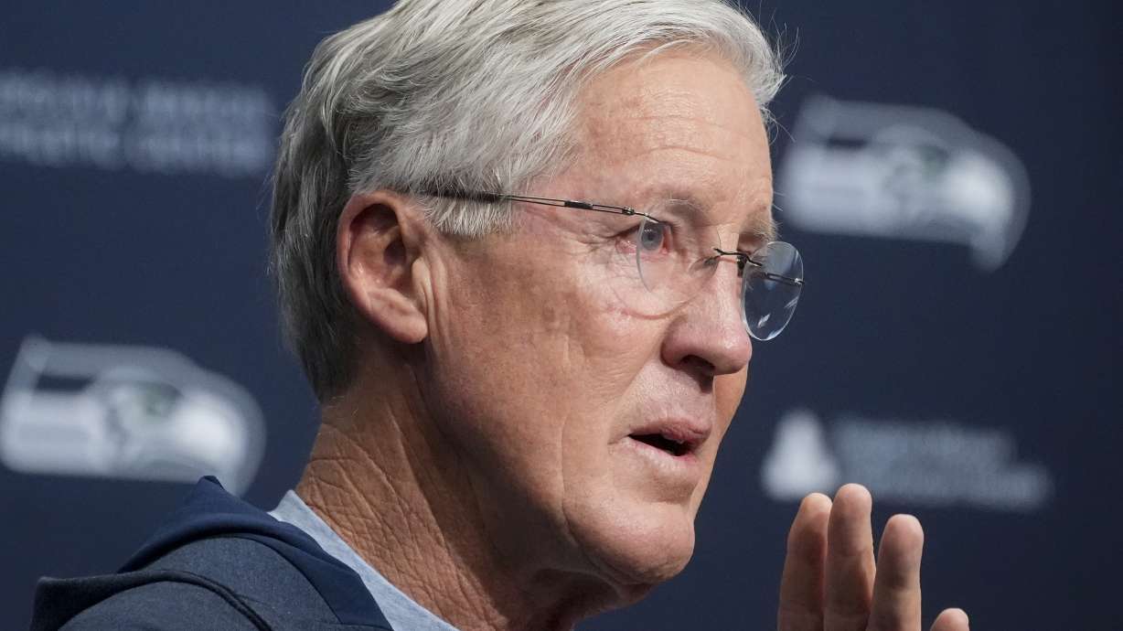 FILE - Former Seattle Seahawks head coach Pete Carroll becomes emotional as he speaks during a media availability after it was announced he will not return as head coach next season, Jan. 10, 2024, at the NFL football team's headquarters in Renton, Wash.