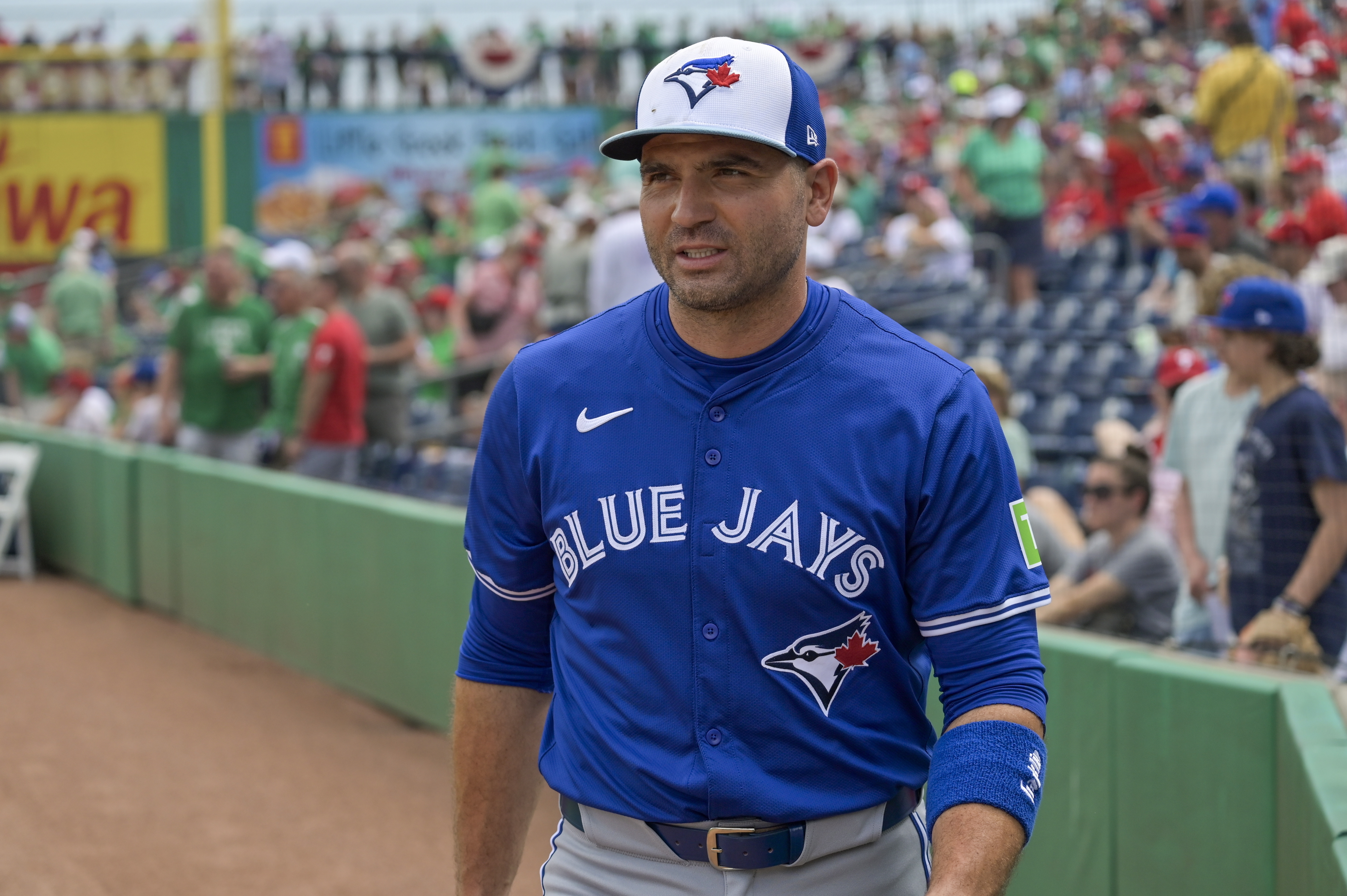 FILE - Toronto Blue Jays' Joey Votto walks to the dugout before a spring training baseball game against the Philadelphia Phillies, March 17, 2024, in Clearwater, Fla. 