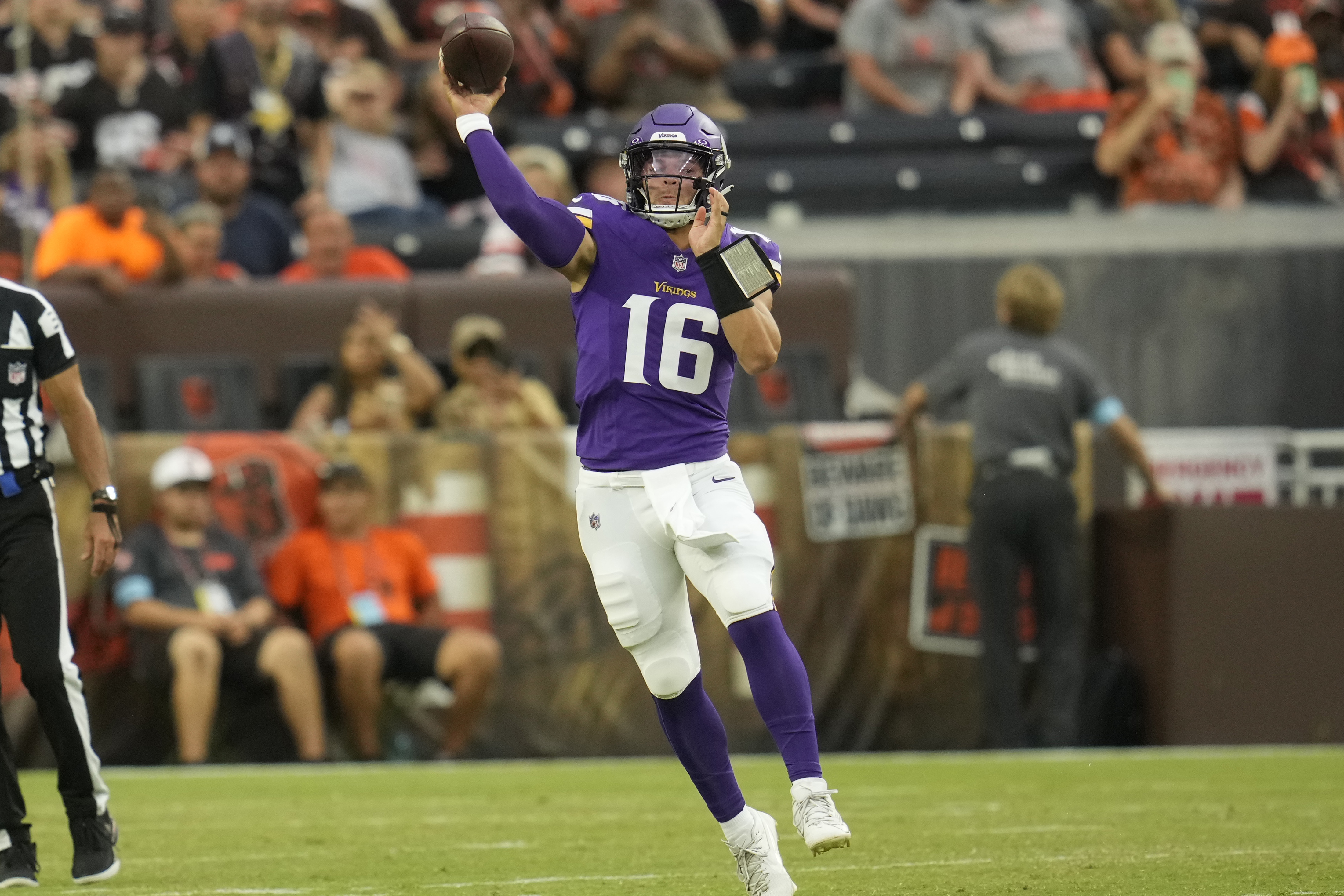 Minnesota Vikings quarterback Jaren Hall (16) throws for a touchdown against the Cleveland Browns during the second half of an NFL preseason football game, Saturday, Aug. 17, 2024, in Cleveland. 