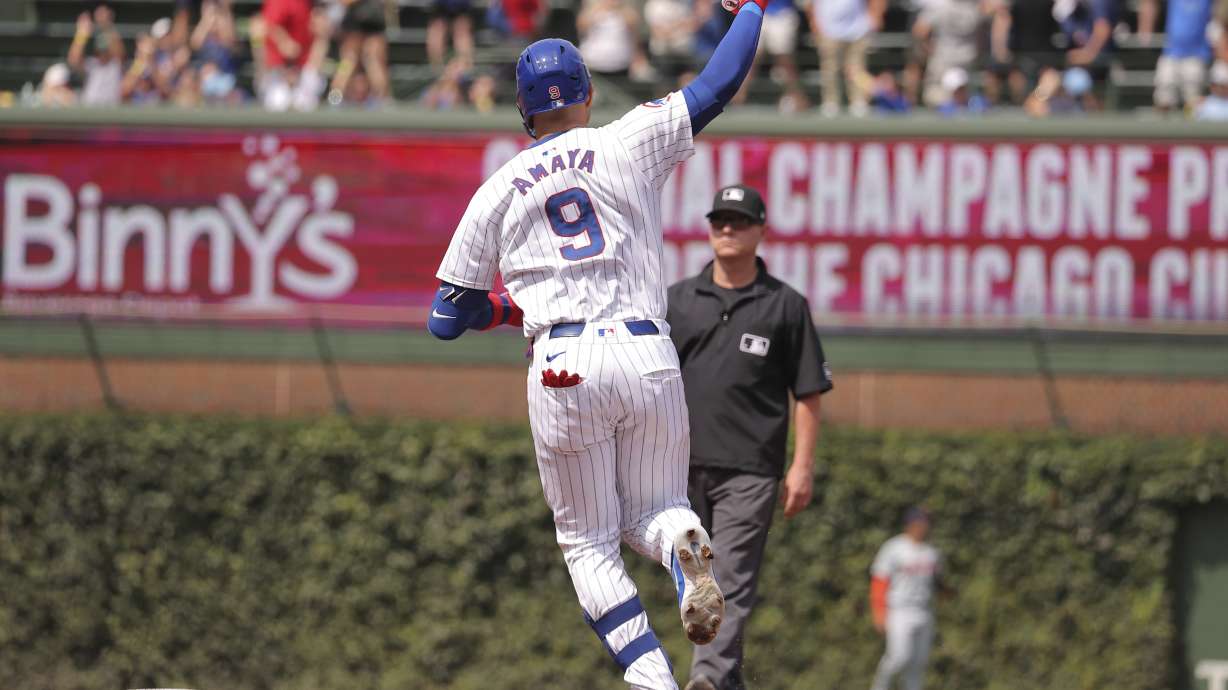 Chicago Cubs' Miguel Amaya celebrates his grand slam during the second inning against the Detroit Tigers, Thursday, Aug. 22, 2024, in Chicago.