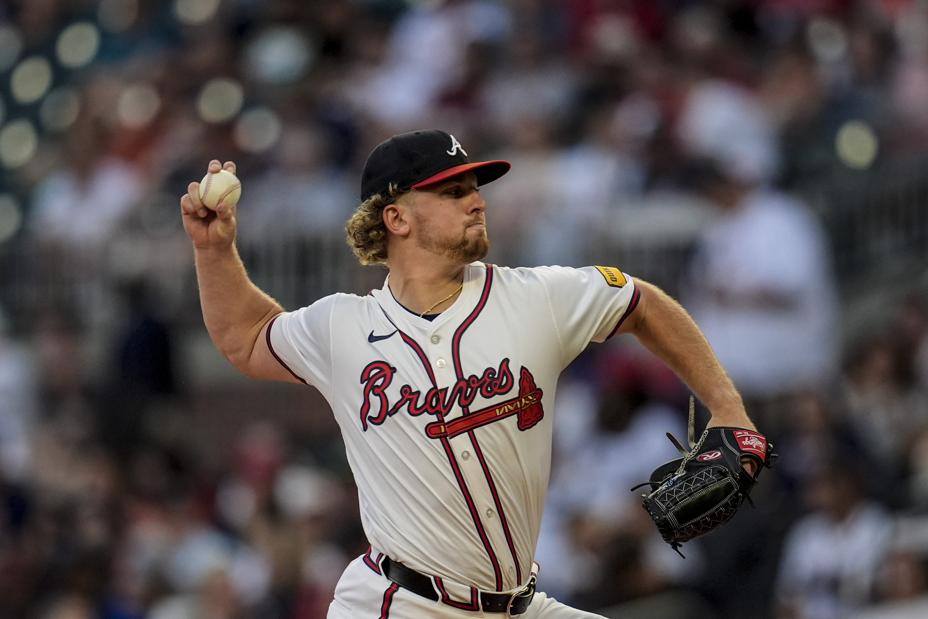 Atlanta Braves pitcher Spencer Schwellenbach (56) deloivers against the Philadelphia Phillies in the second inning of a baseball game, Thursday, Aug. 22, 2024, in Atlanta. 