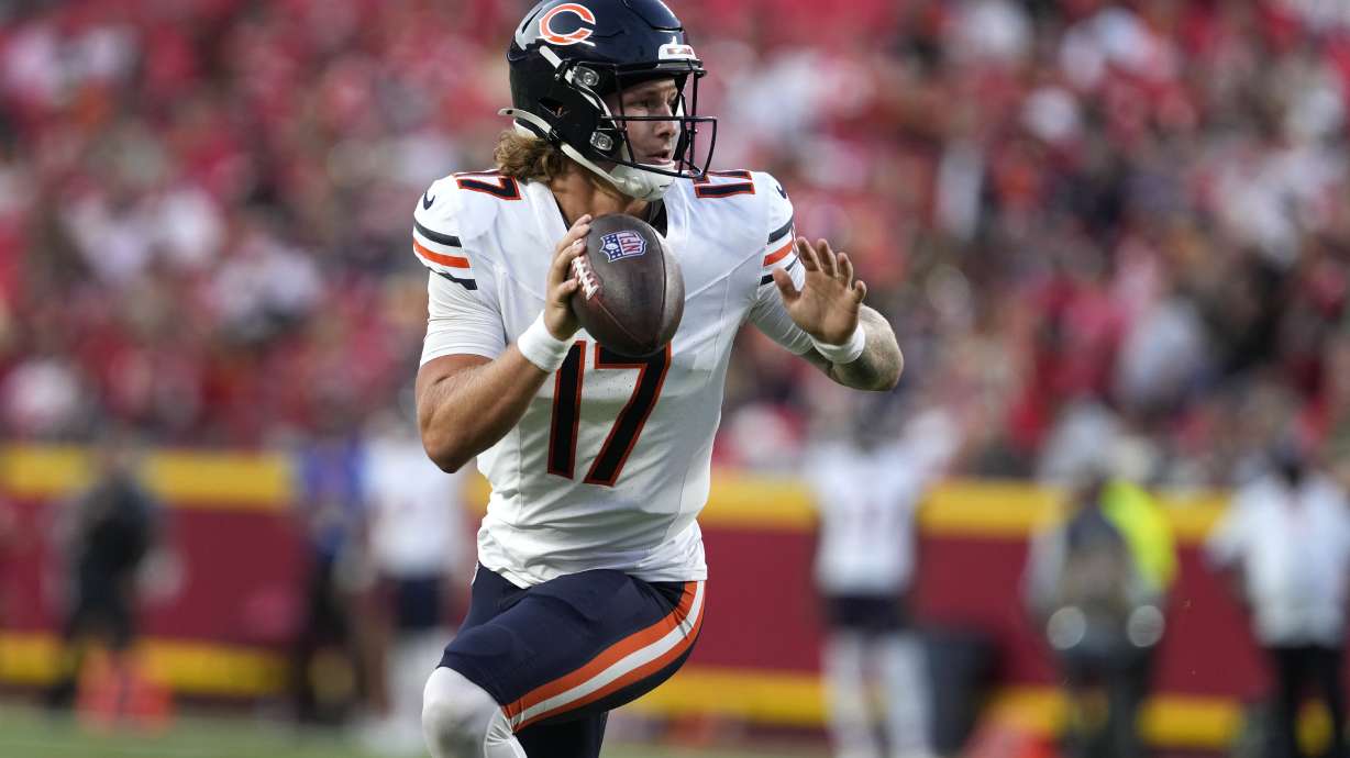 Chicago Bears quarterback Tyson Bagent scores on a touchdown run during the first half of an NFL preseason football game against the Kansas City Chiefs Thursday, Aug. 22, 2024, in Kansas City, Mo.