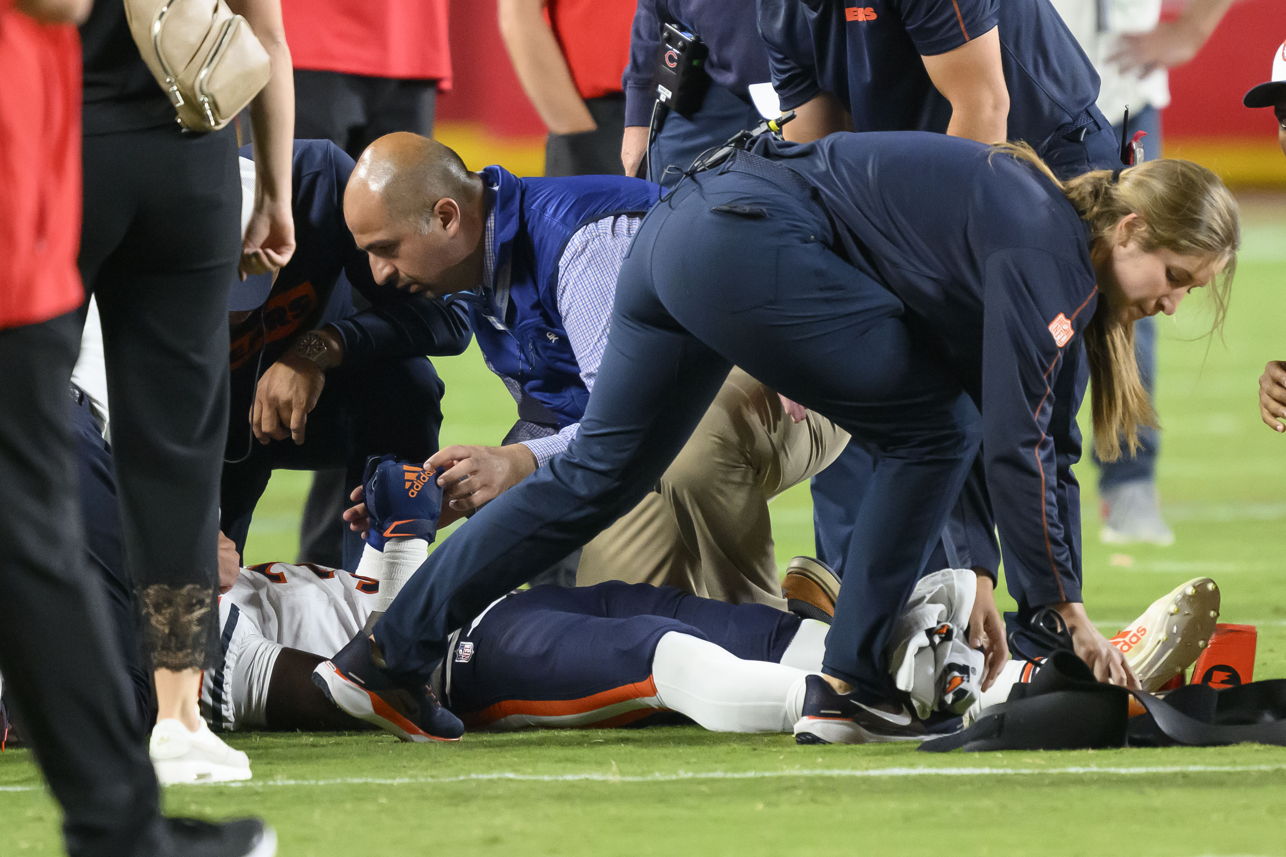 Bears' Douglas Coleman III immobilized, taken from field on stretcher ...