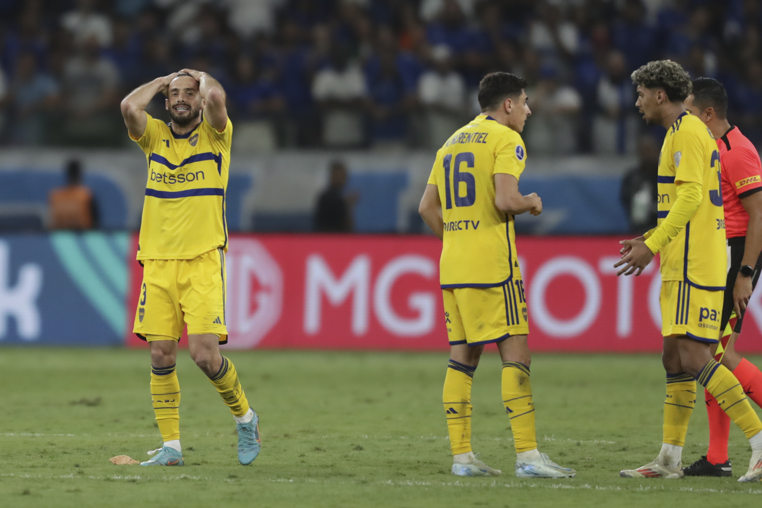 Players of Argentina's Boca Juniors react after losing against Brazil's Cruzeiro at the end of a Copa Sudamericana round of 16 second leg soccer match at Mineirao stadium in Belo Horizonte, Brazil, Thursday, Aug. 22, 2024. 