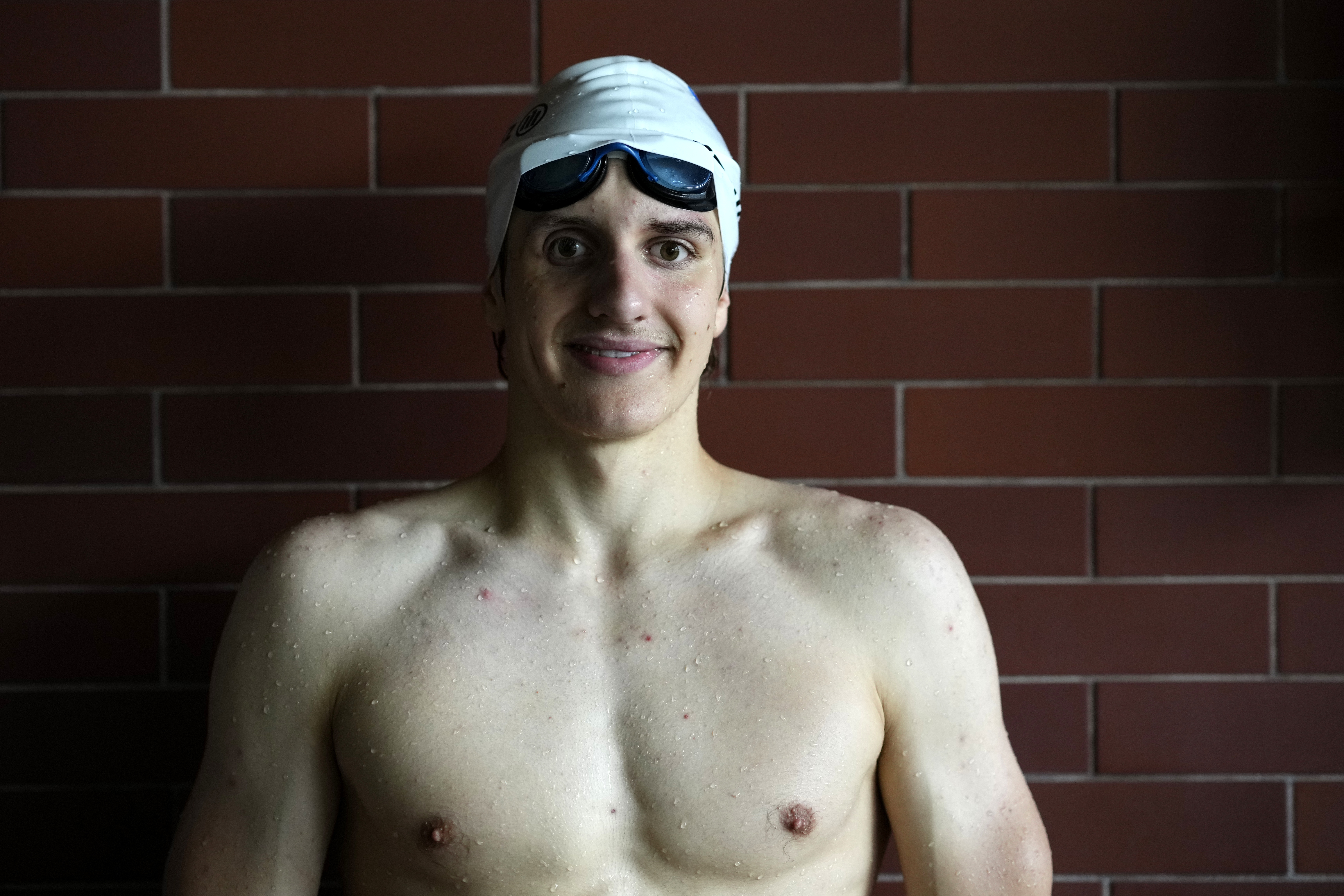 David Kratochvil, a teenage swimmer who prepares for the Paralympic Games in Paris, poses for a photo during his training in Tachov, Czech Republic, Wednesday, July 3, 2024. 