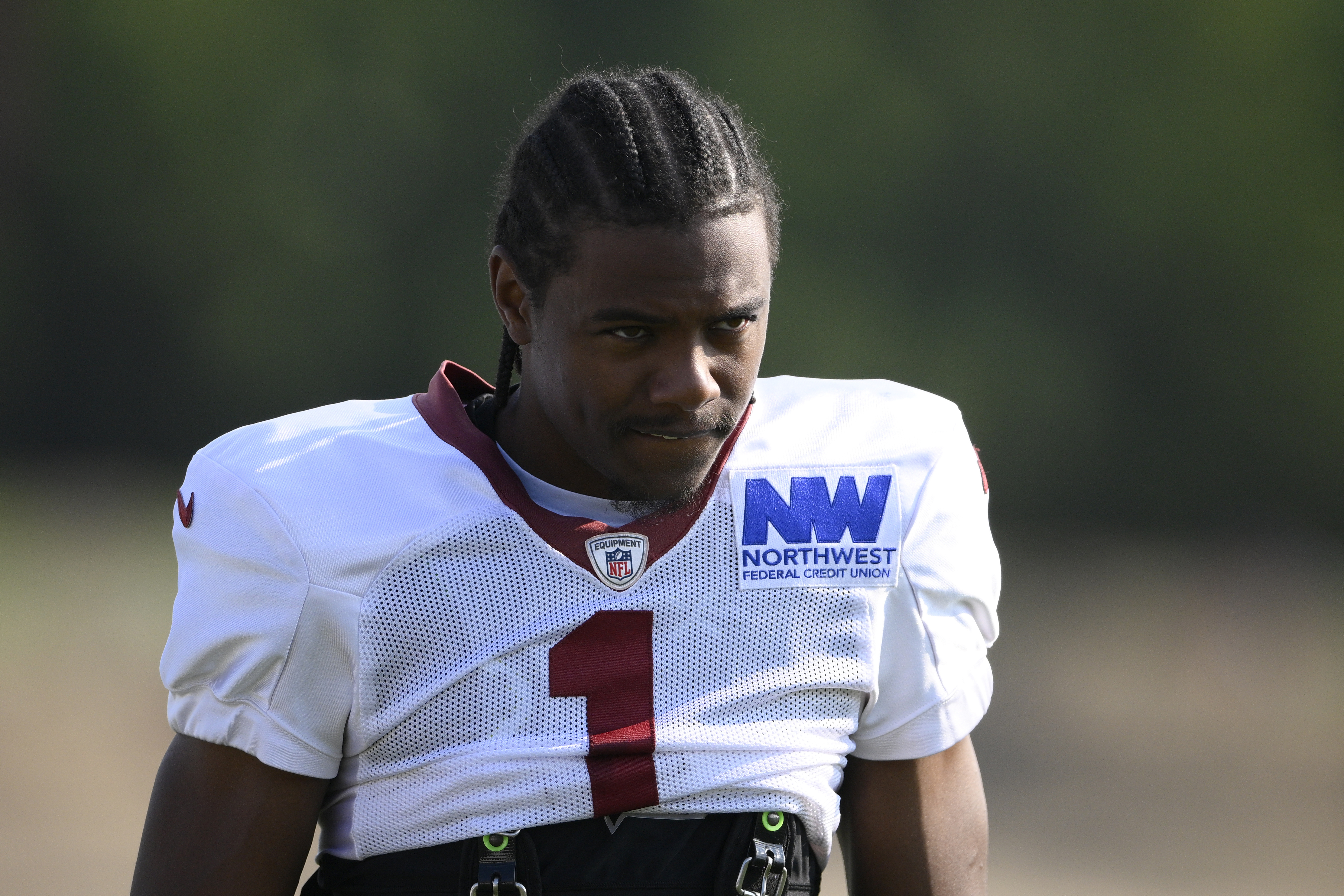 FILE - Washington Commanders wide receiver Jahan Dotson (1) works out during NFL football training camp, Monday, July 29, 2024, in Ashburn, Va. 