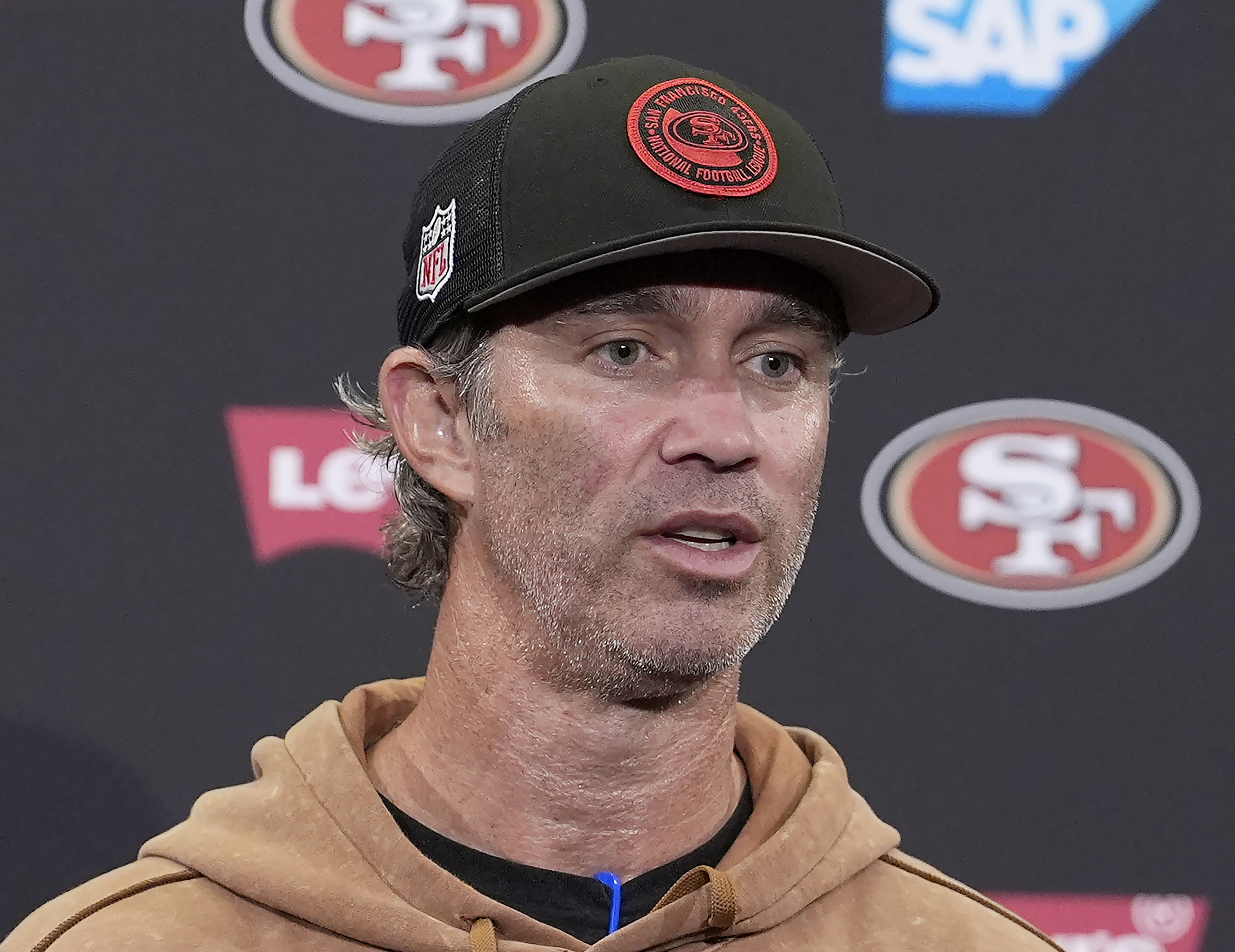 FILE - San Francisco 49ers defensive coordinator Nick Sorensen speaks at a news conference during NFL football training camp in Santa Clara, Calif., July 31, 2024. 