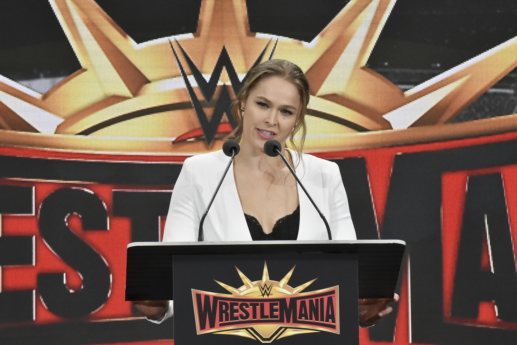 FILE - Professional wrestler Ronda Rousey speaks at a press conference in East Rutherford, N.J., Friday, March 16, 2018.