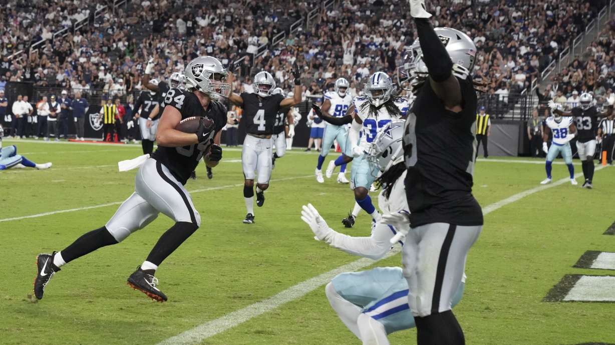 Las Vegas Raiders tight end Harrison Bryant (84) scores a touchdown against the Dallas Cowboys during the second half of an NFL preseason football game, Saturday, Aug. 17, 2024, in Las Vegas.