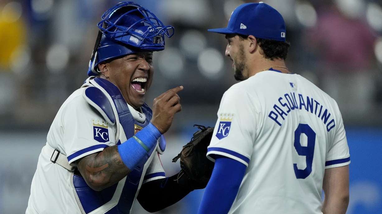 Kansas City Royals' Salvador Perez, left, celebrates with Vinnie Pasquantino (9) during after their baseball game against the Los Angeles Angels Monday, Aug. 19, 2024, in Kansas City, Mo. The Royals won 5-3.