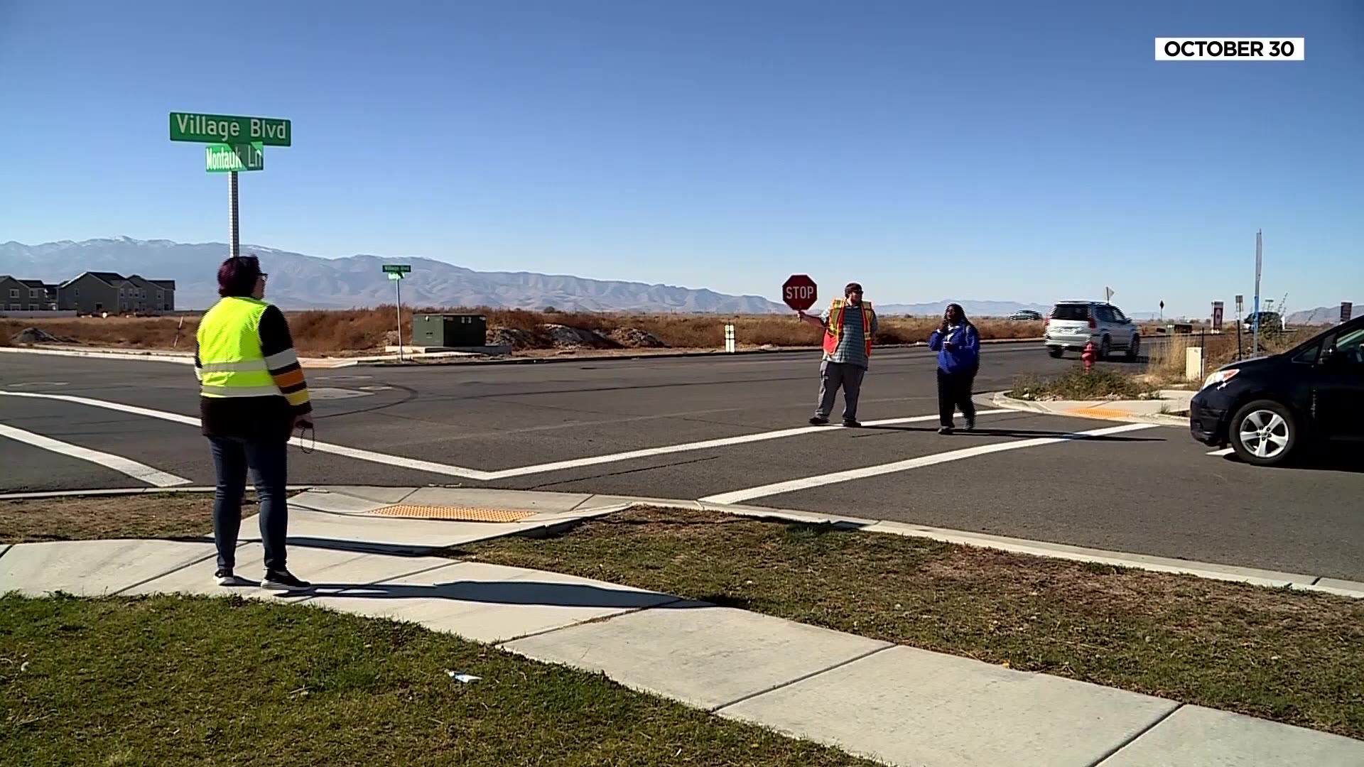 The Montauk Lane and Village Blvd crosswalk while crossing guards escorting students