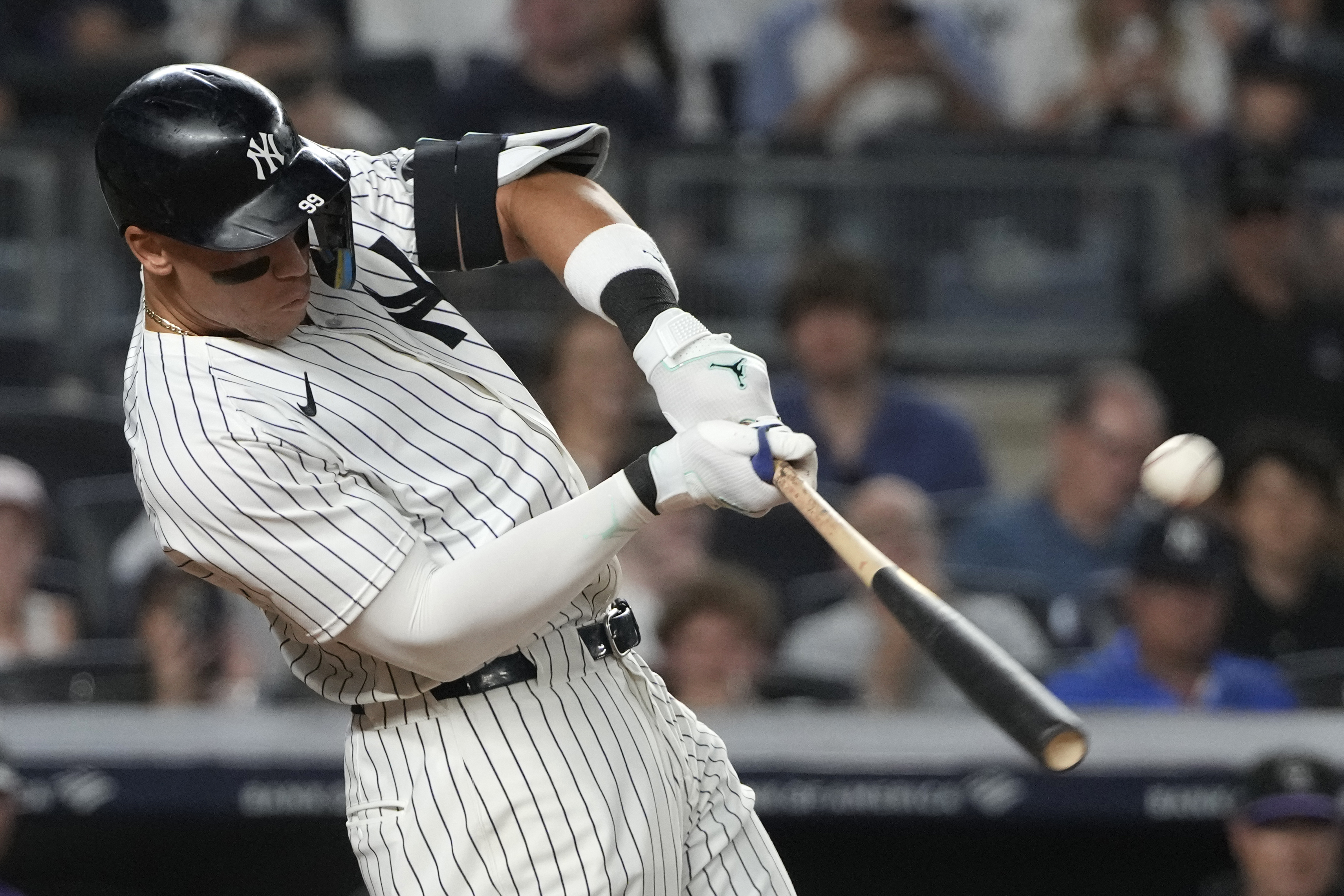 New York Yankees' Aaron Judge hits a home run during the sixth inning of a baseball game against the Colorado Rockies, Friday, Aug. 23, 2024, in New York.