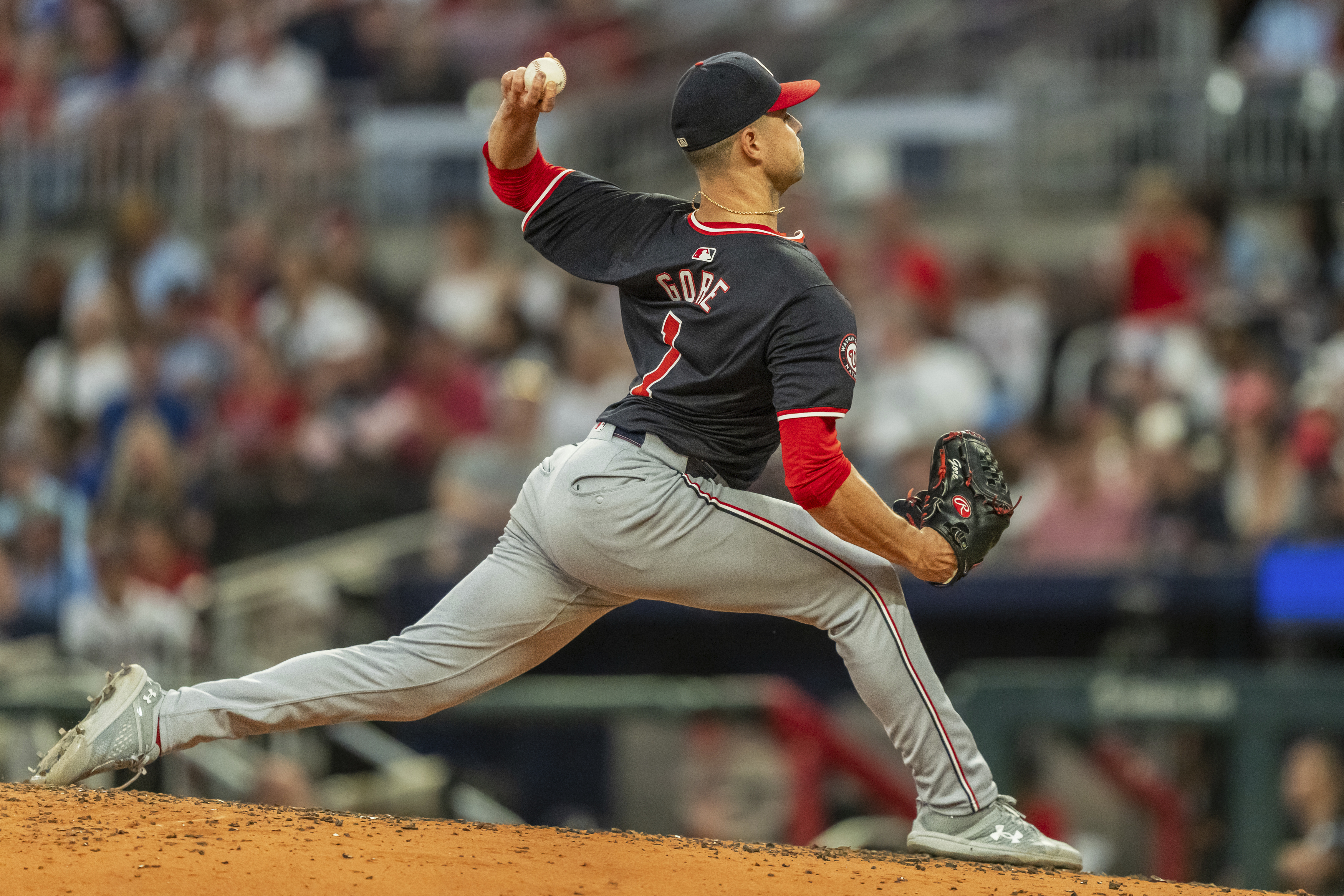 Washington Nationals pitcher MacKenzie Gore throws in the fourth inning of a baseball game against the Atlanta Braves, Friday, Aug. 23, 2024, in Atlanta.