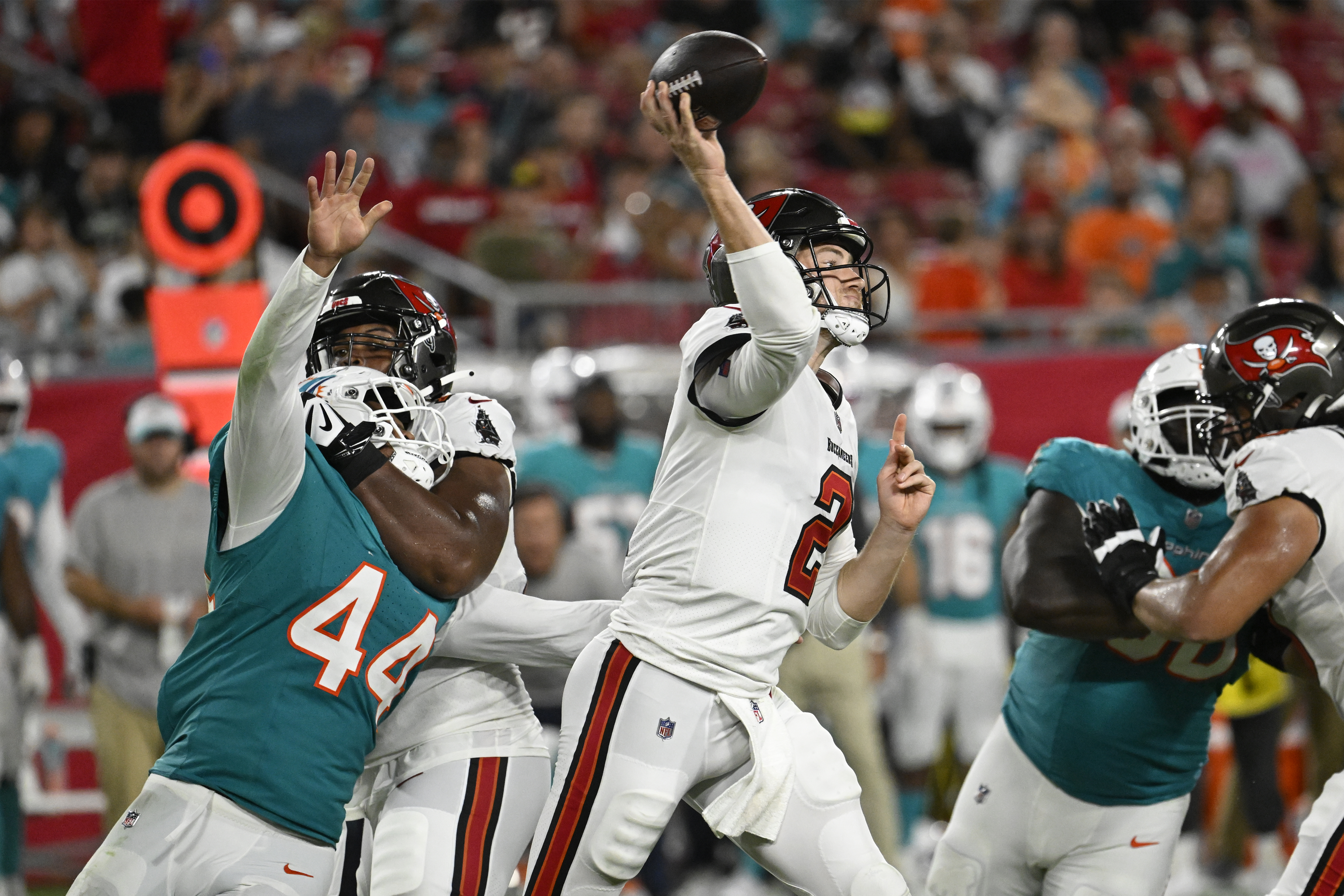 Tampa Bay Buccaneers quarterback Kyle Trask (2) aims a pass during the first half of a pre season NFL football game against the Miami Dolphins, Friday, Aug. 23, 2024, in Tampa, Fla.