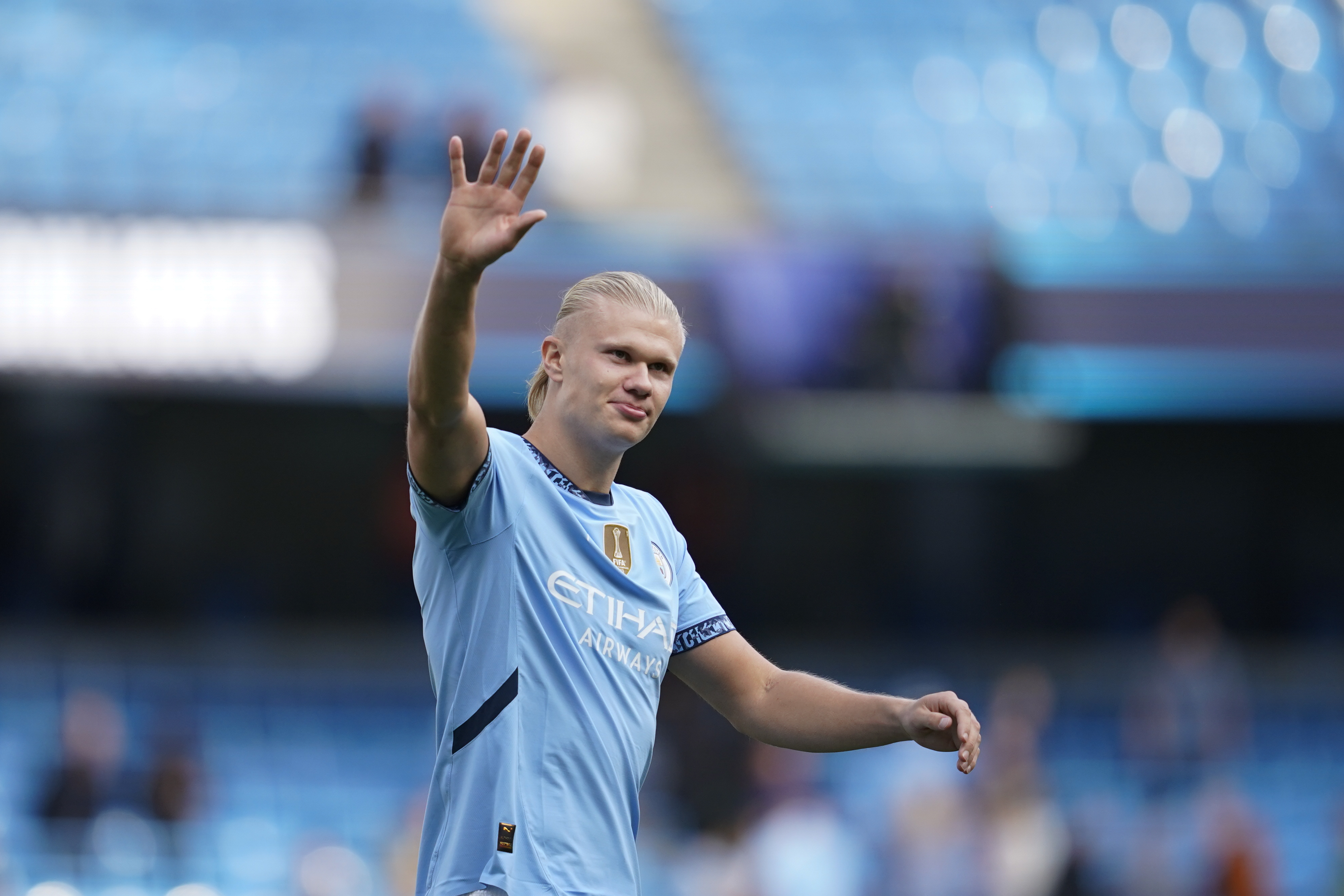 Manchester City's Erling Haaland waves fans after the English Premier League soccer match between Manchester City and Ipswich Town at the Etihad Stadium in Manchester, England, Saturday, Aug. 24, 2024.
