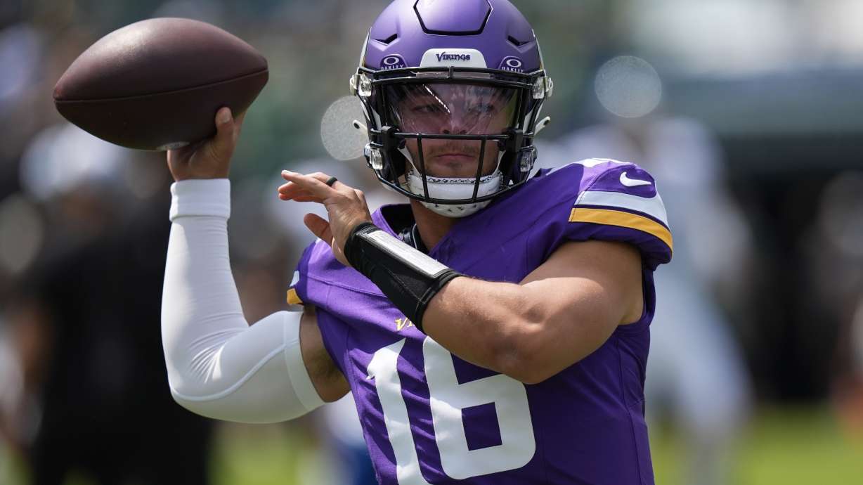 Minnesota Vikings quarterback Jaren Hall warms up before a preseason NFL football game against the Philadelphia Eagles on Saturday, Aug. 24, 2024, in Philadelphia.